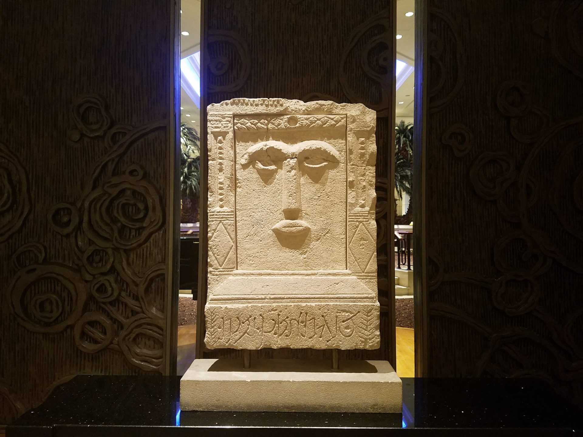 a stone sculpture in a room