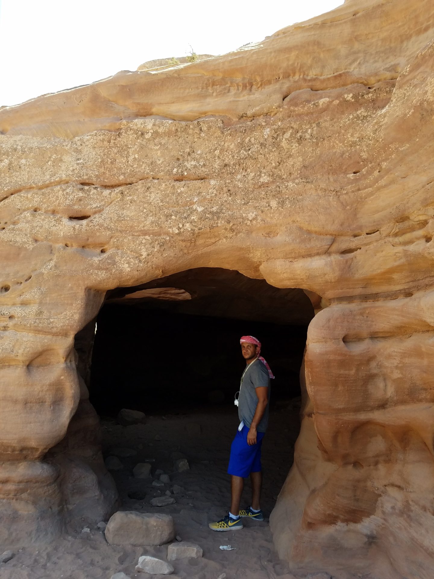 a man standing in a cave