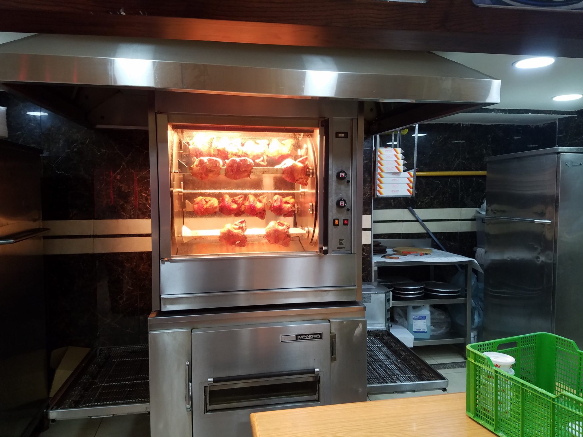 a large oven with meat inside