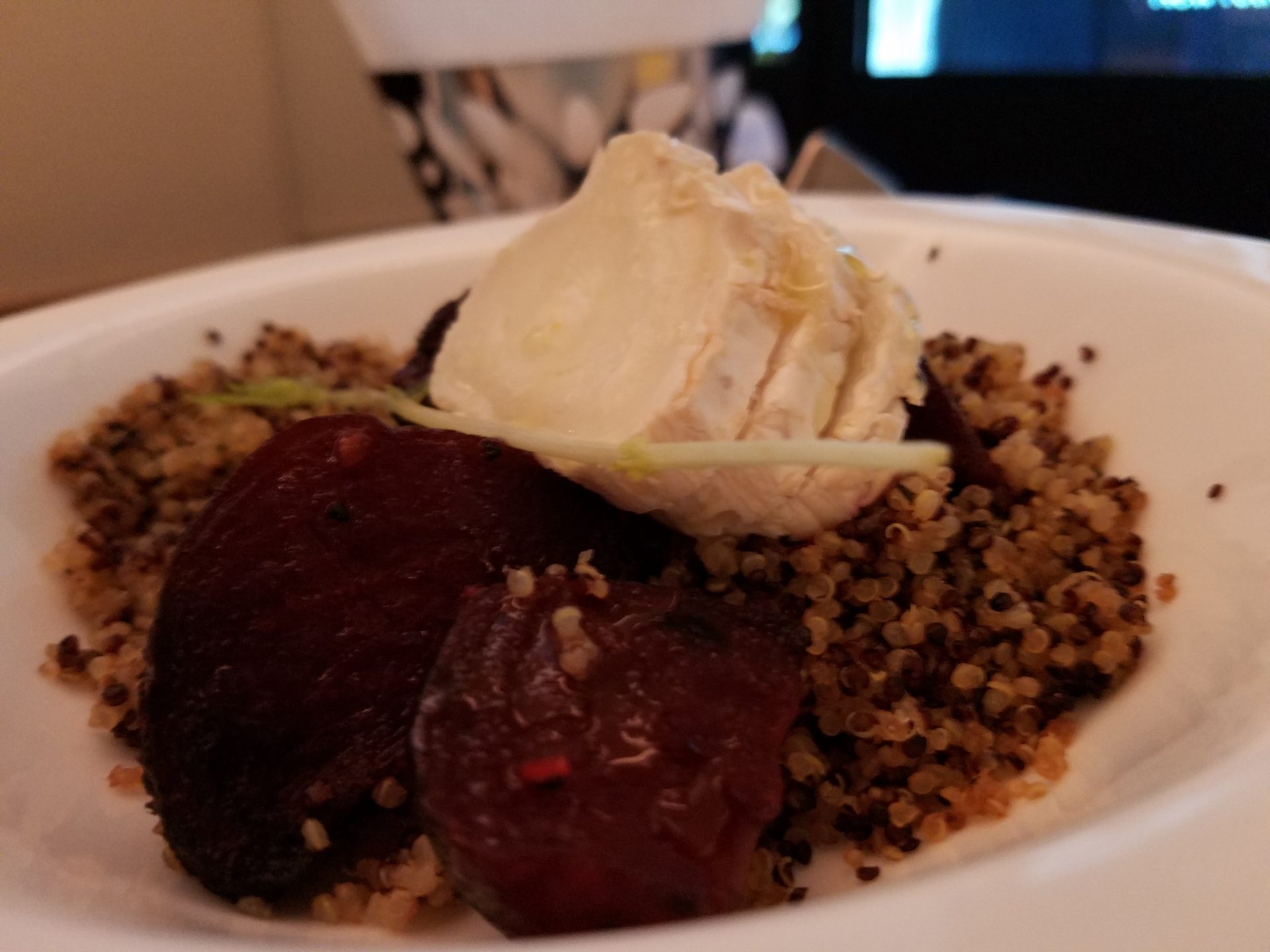 a bowl of food with beets and quinoa