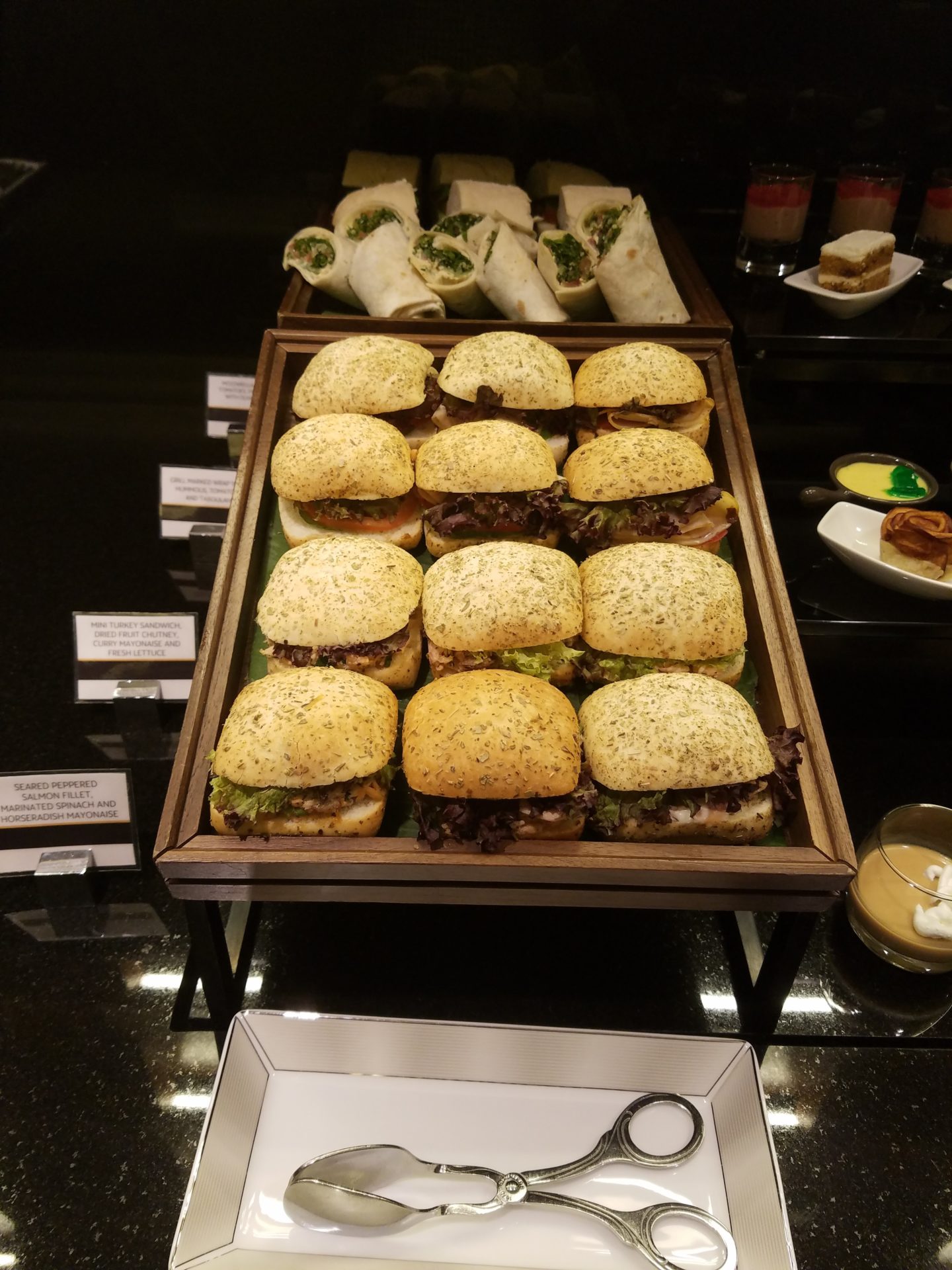 a tray of sandwiches on a table