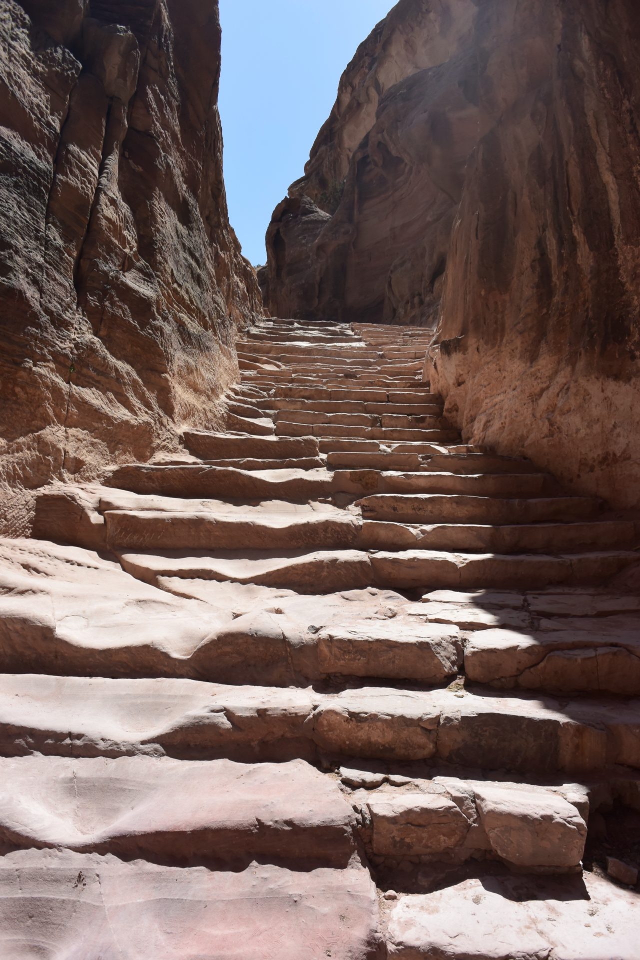 a stone stairs in a canyon