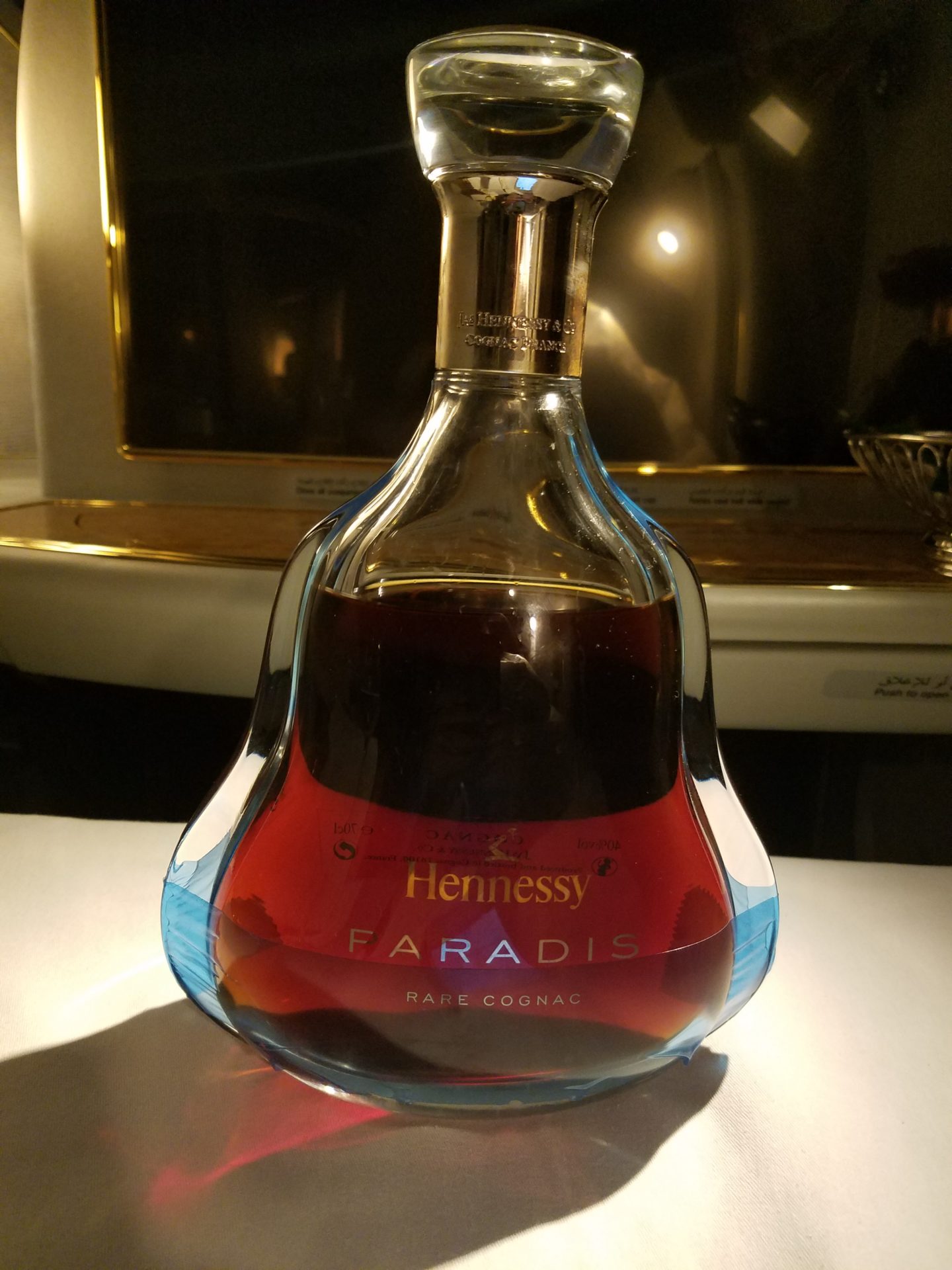 a glass bottle with a liquid in it