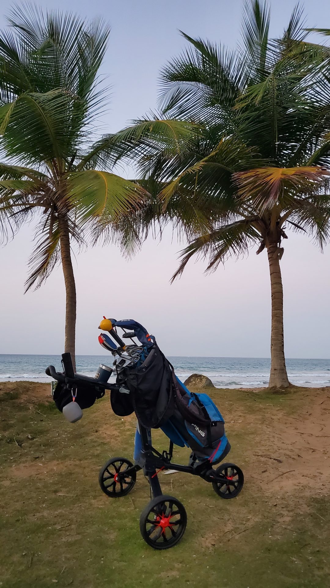 a golf bag on a beach