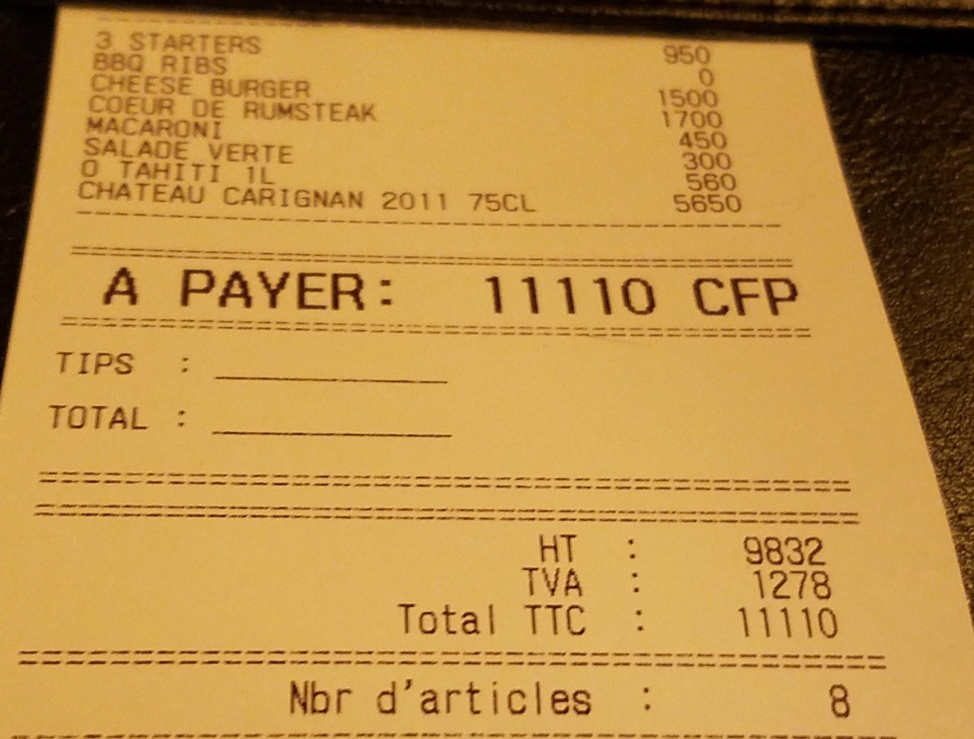 a receipt on a leather cover