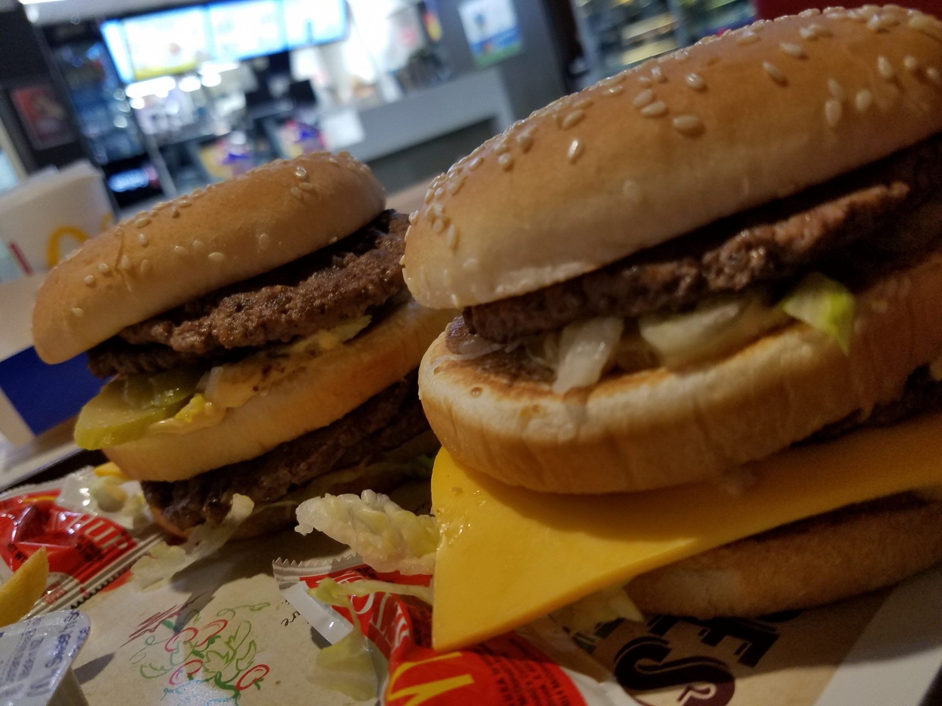 two hamburgers on a table
