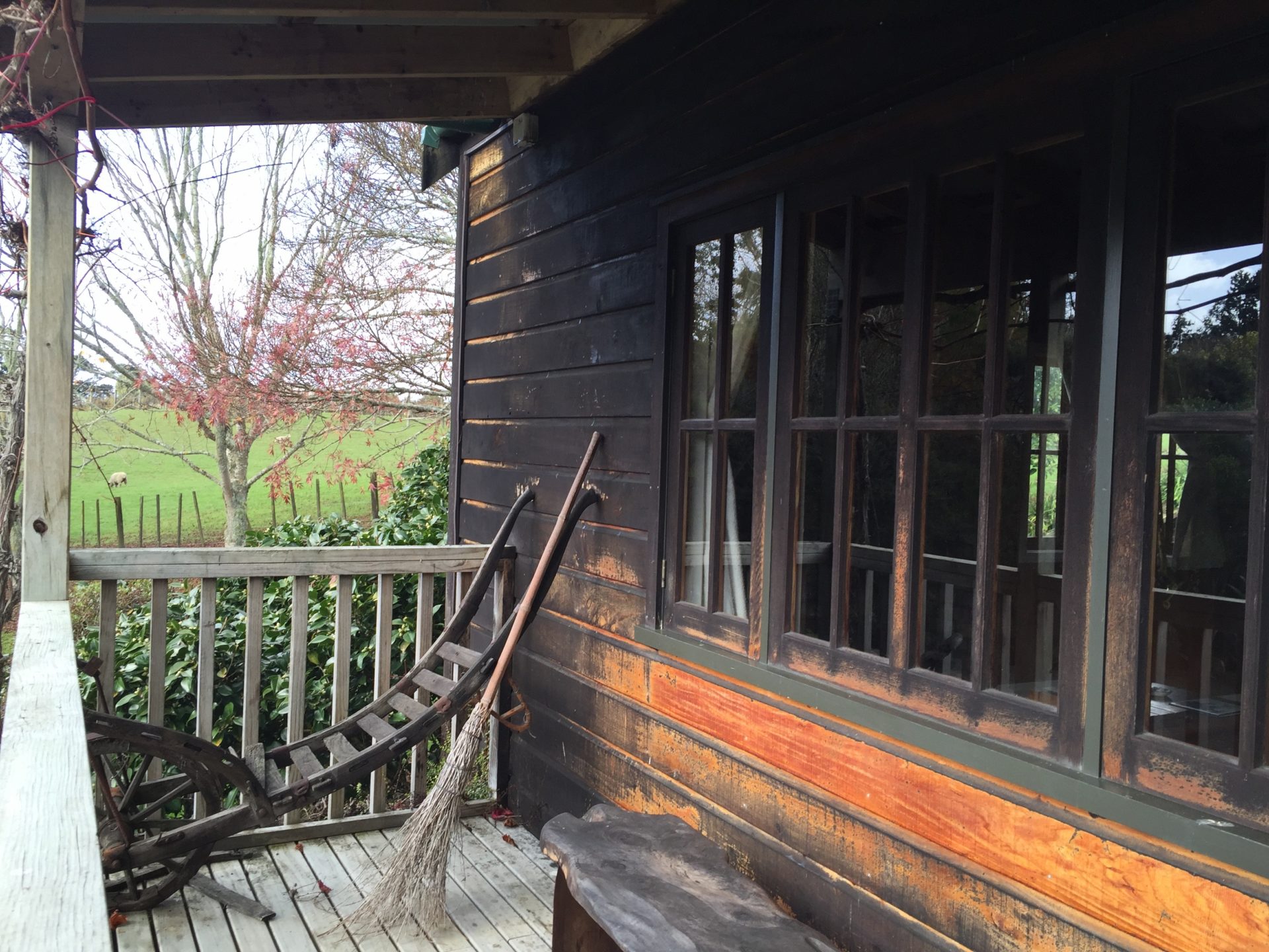 a porch of a log cabin