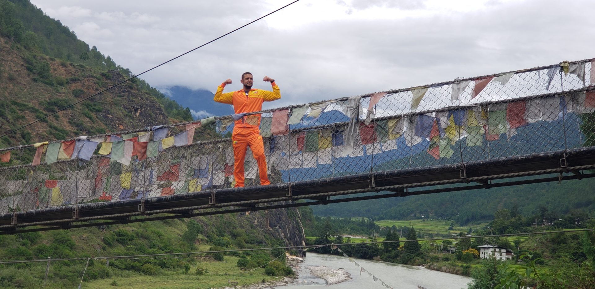 a man standing on a bridge