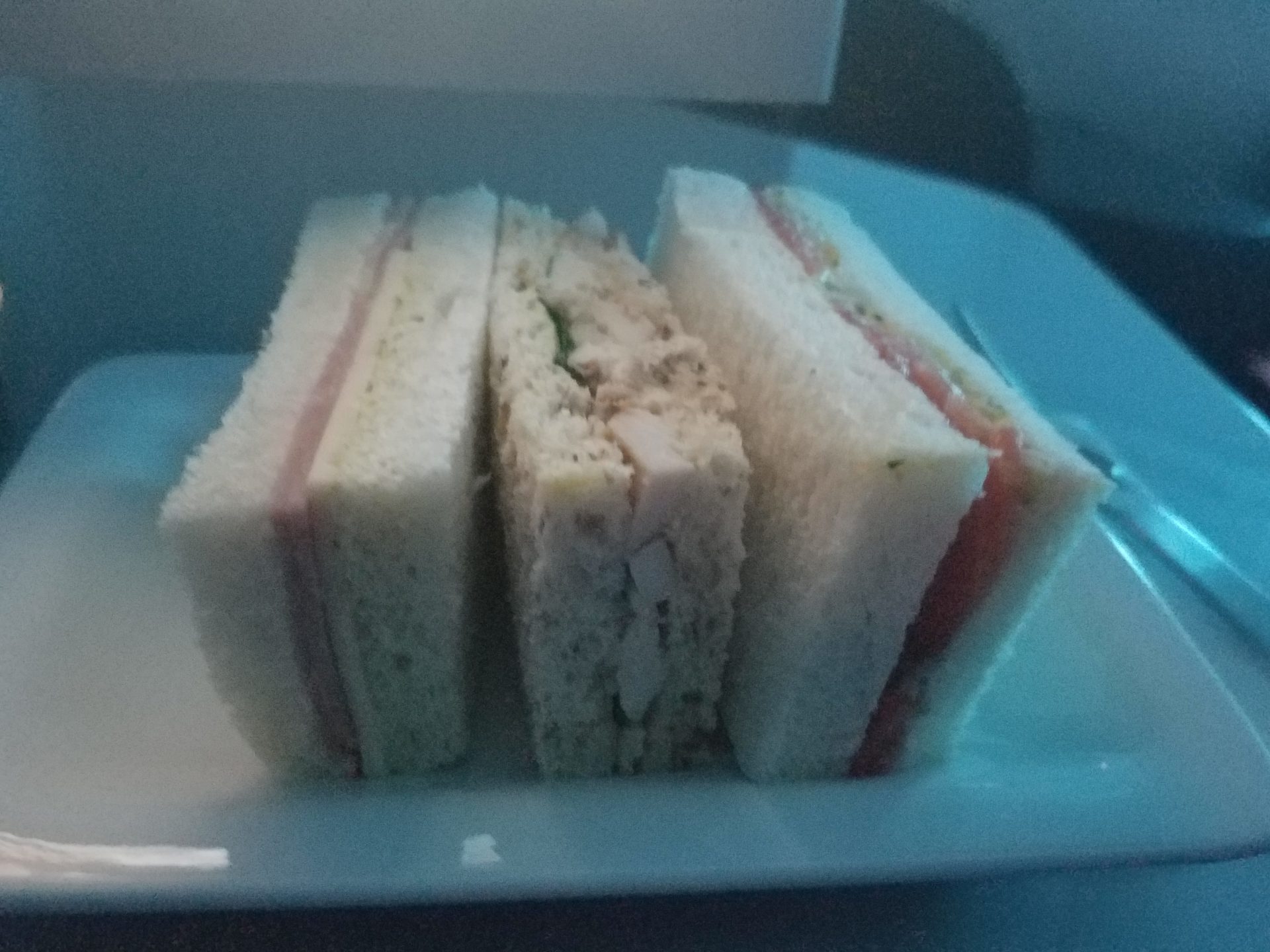 a plate of sandwiches on a table