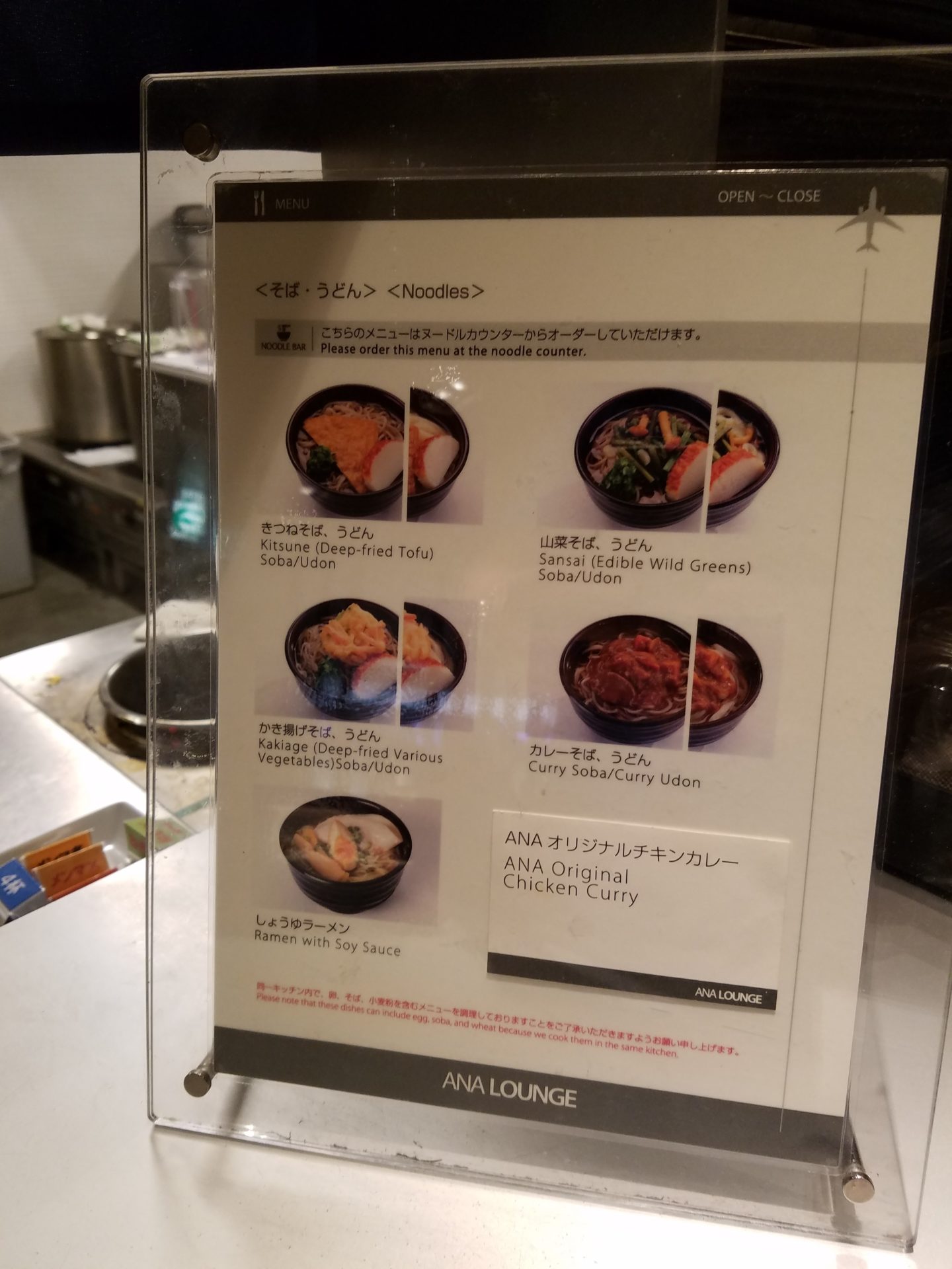 a menu in a plastic holder