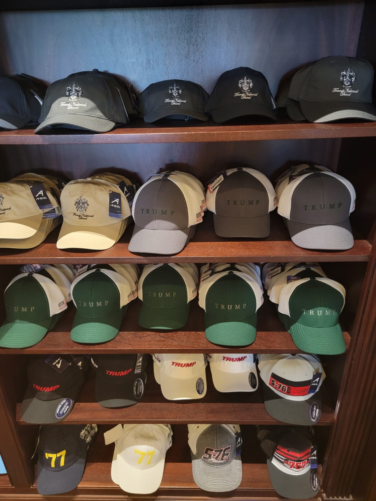 a shelf with hats on it