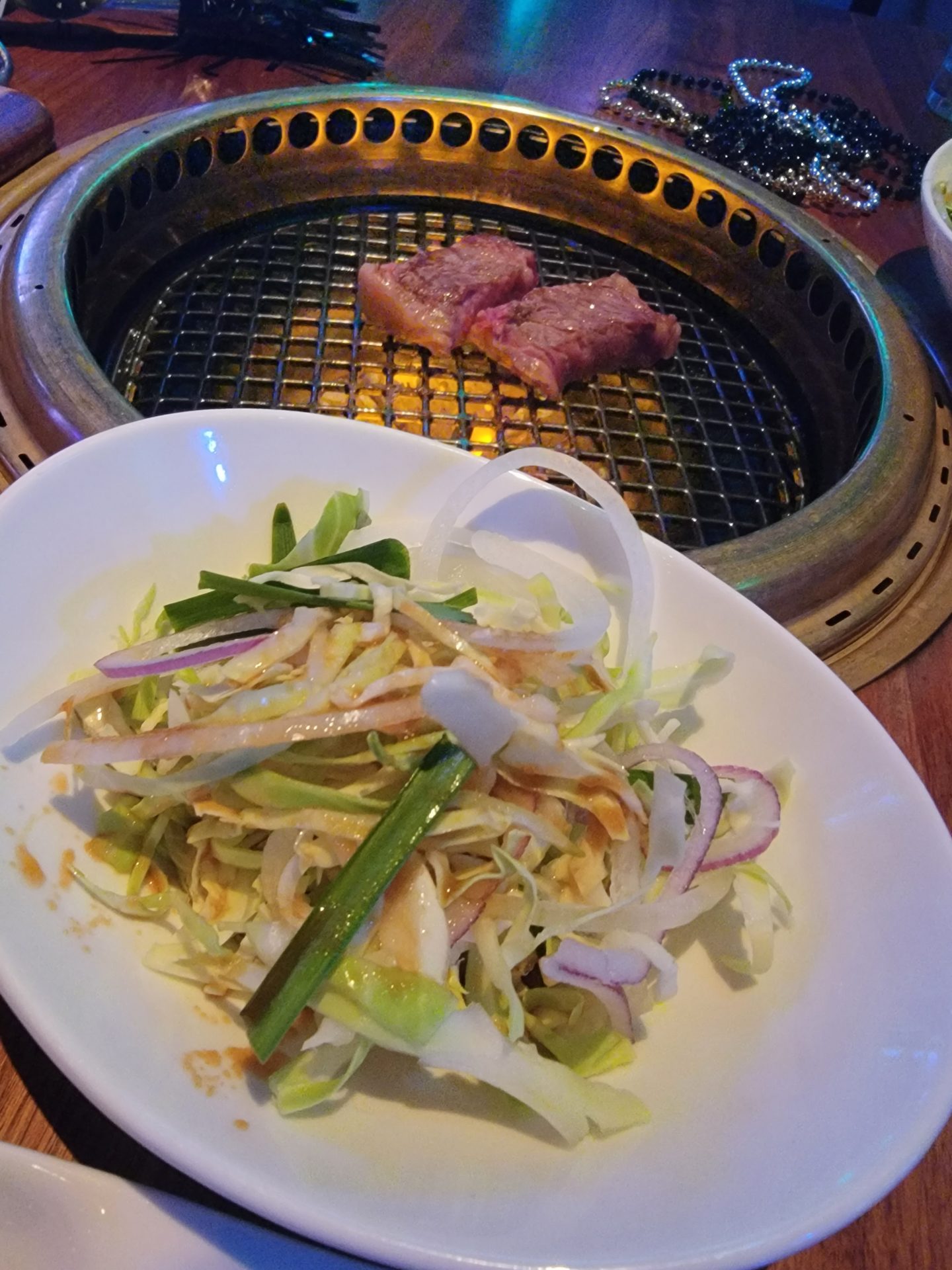 a plate of food on a grill