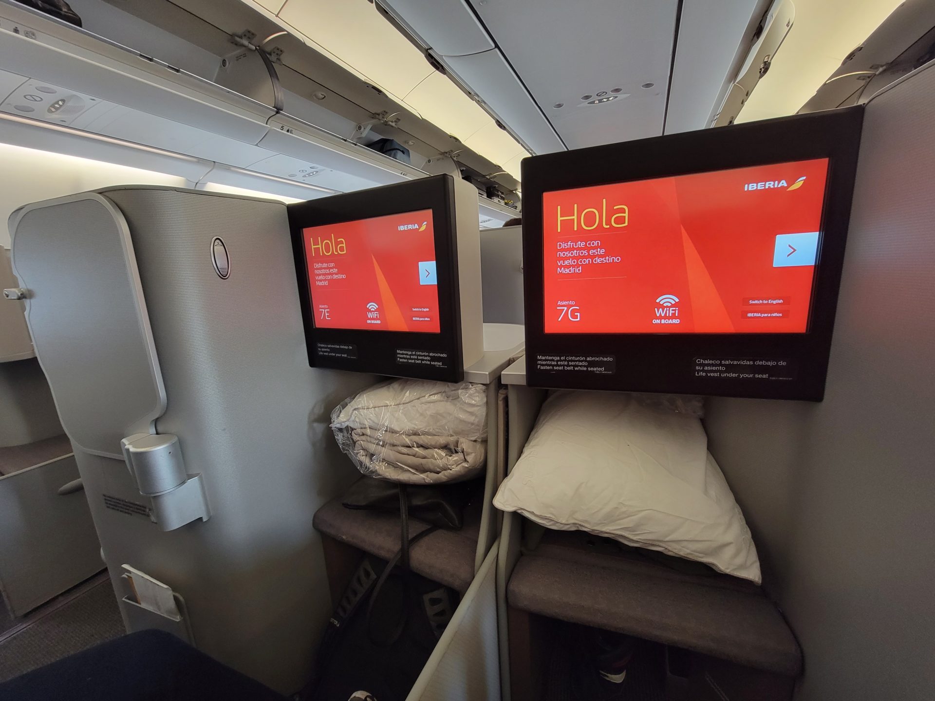 two monitors on a plane