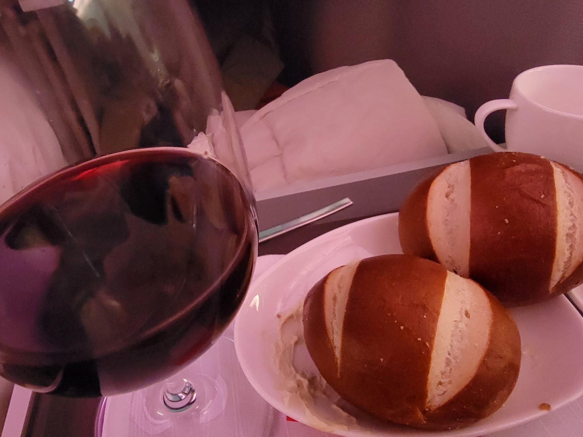 a plate of bread and a glass of wine