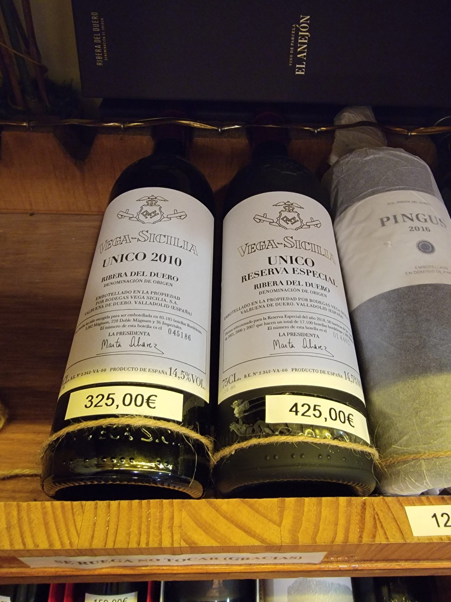 bottles of wine on a shelf