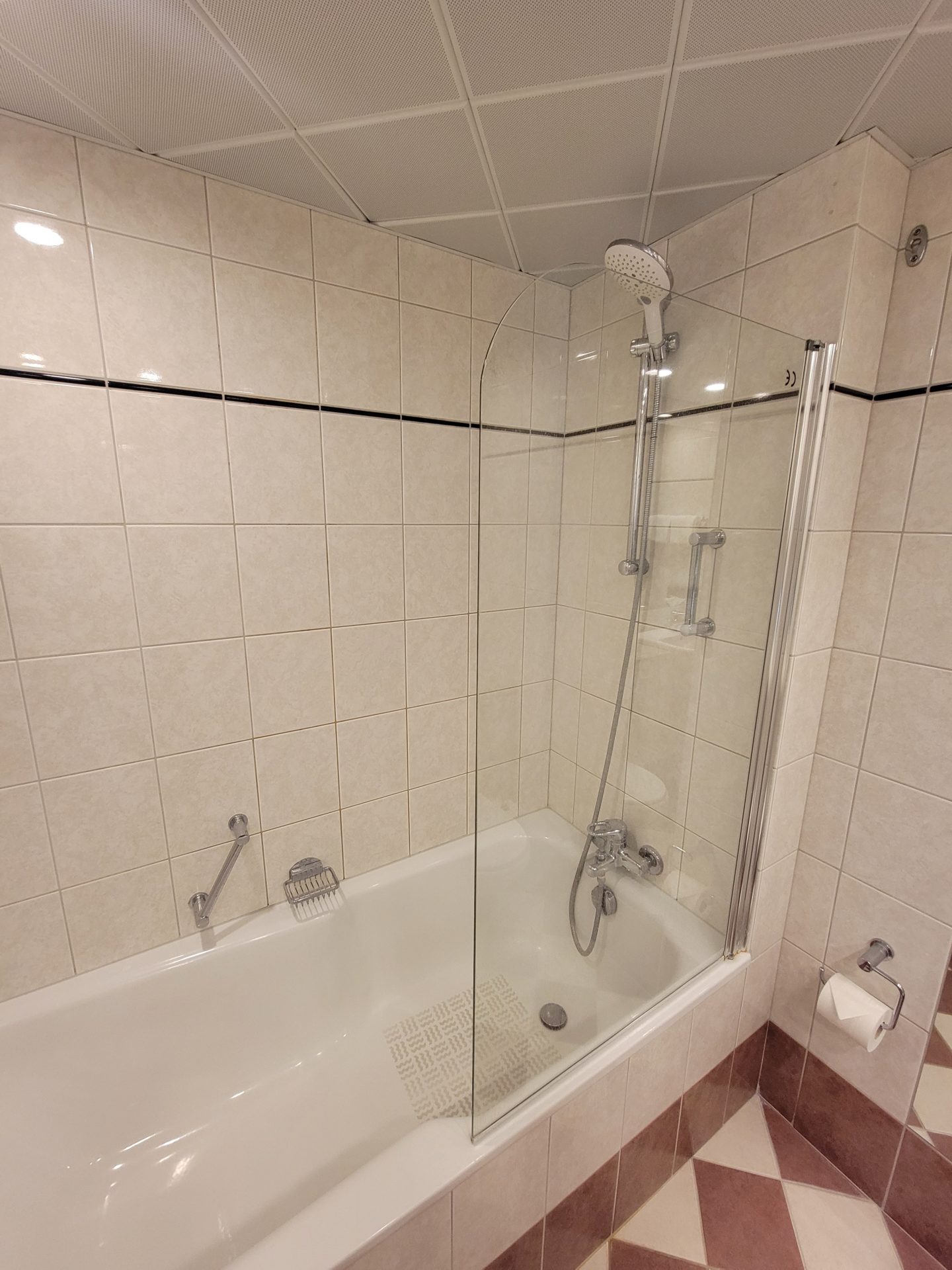 a shower and bathtub in a bathroom