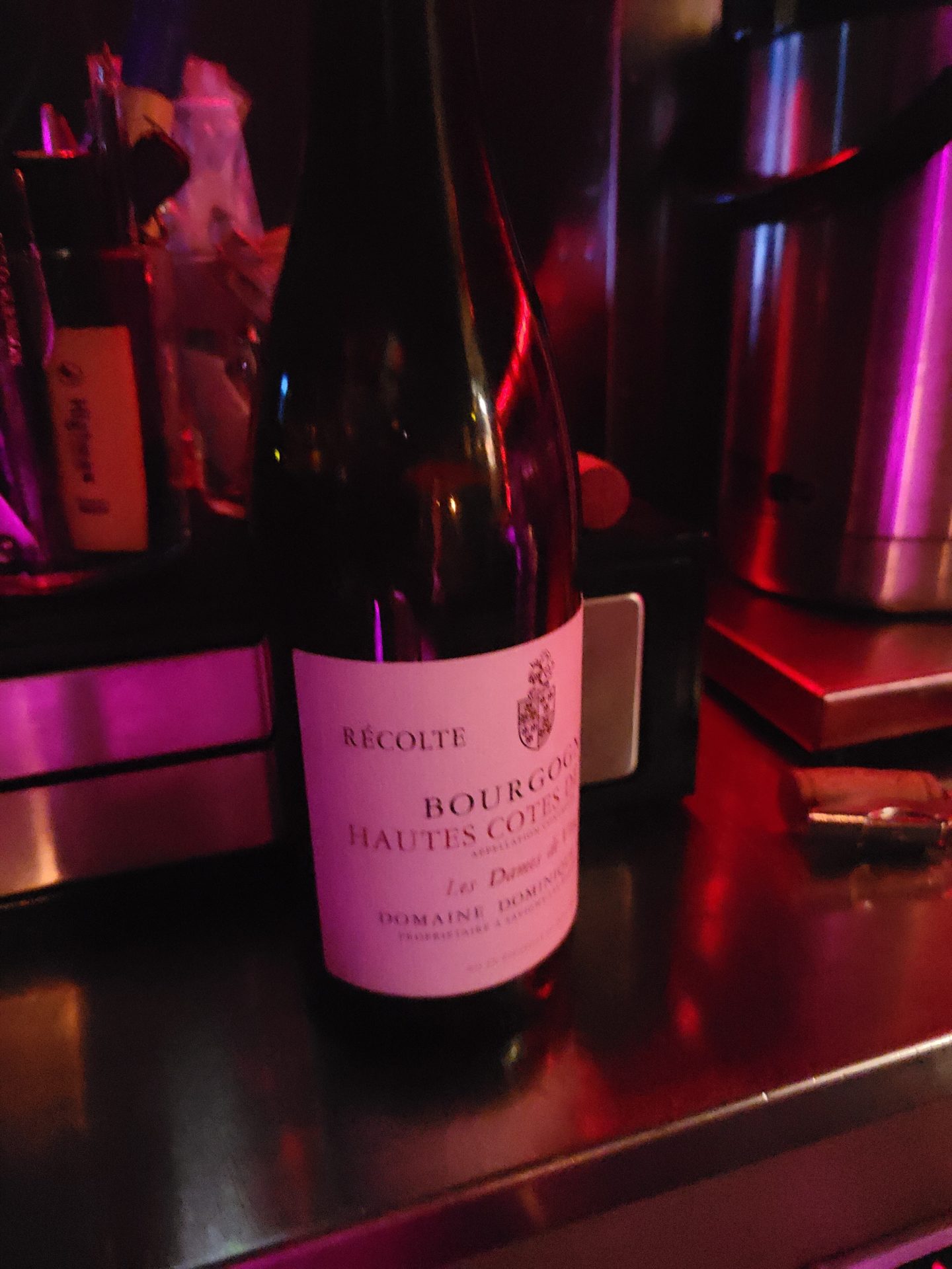 a bottle of wine on a counter