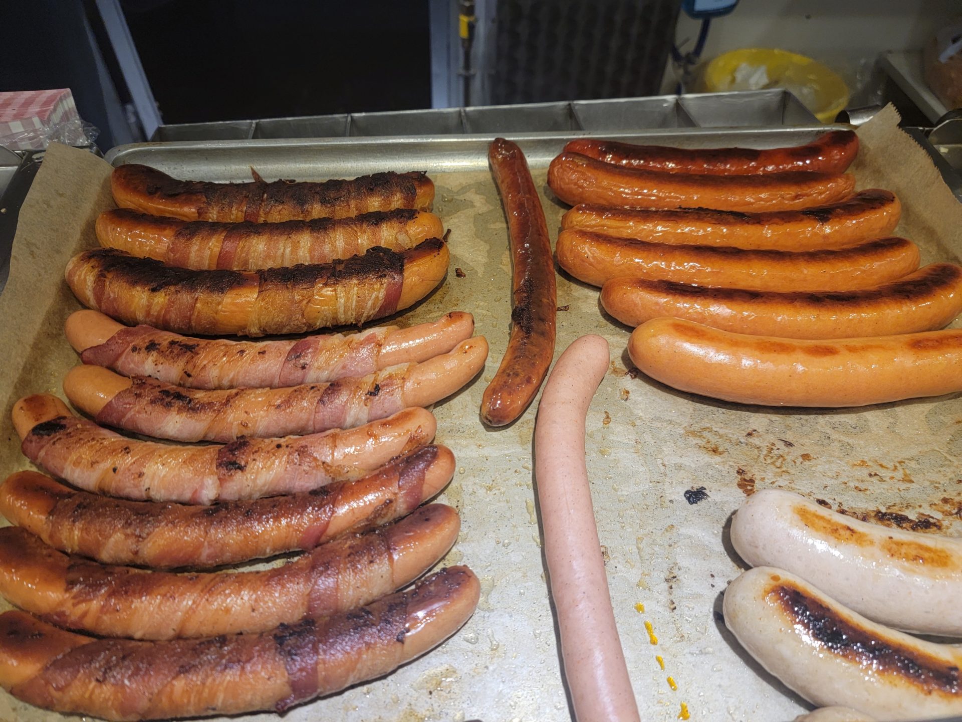 a tray of sausages on a pan