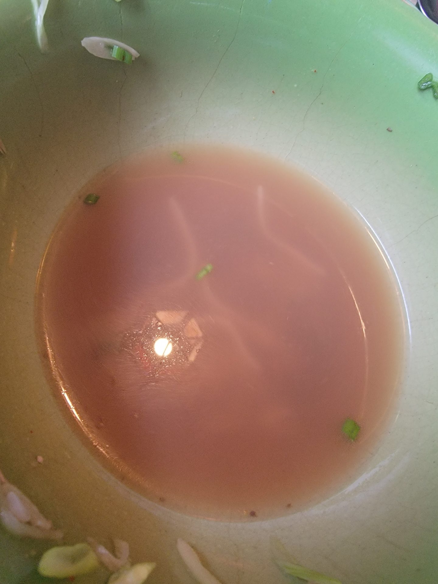 a bowl of pink soup
