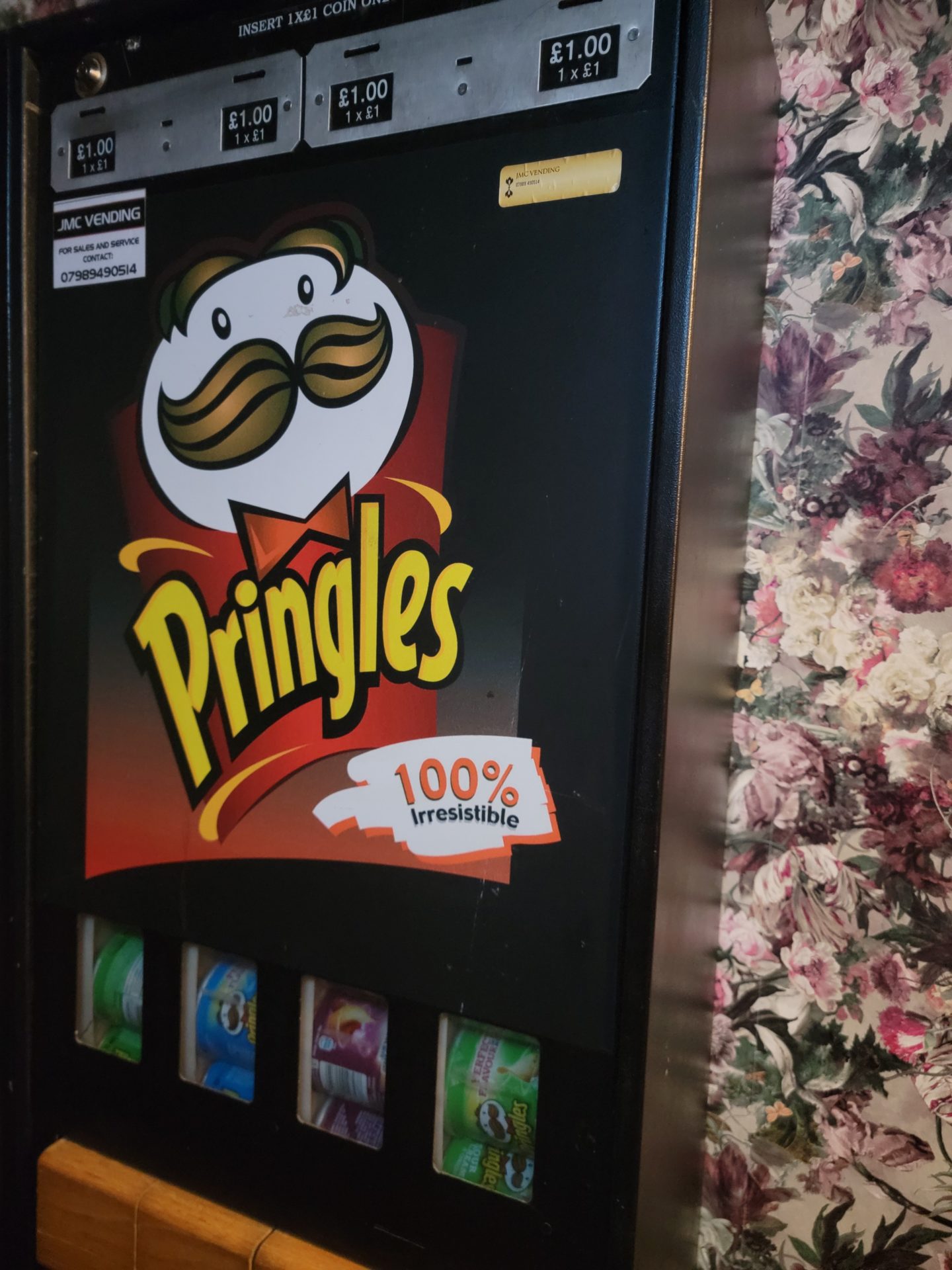 a vending machine with a logo