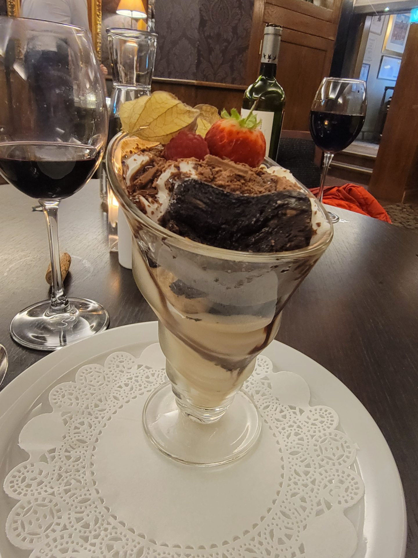 a dessert in a glass cup