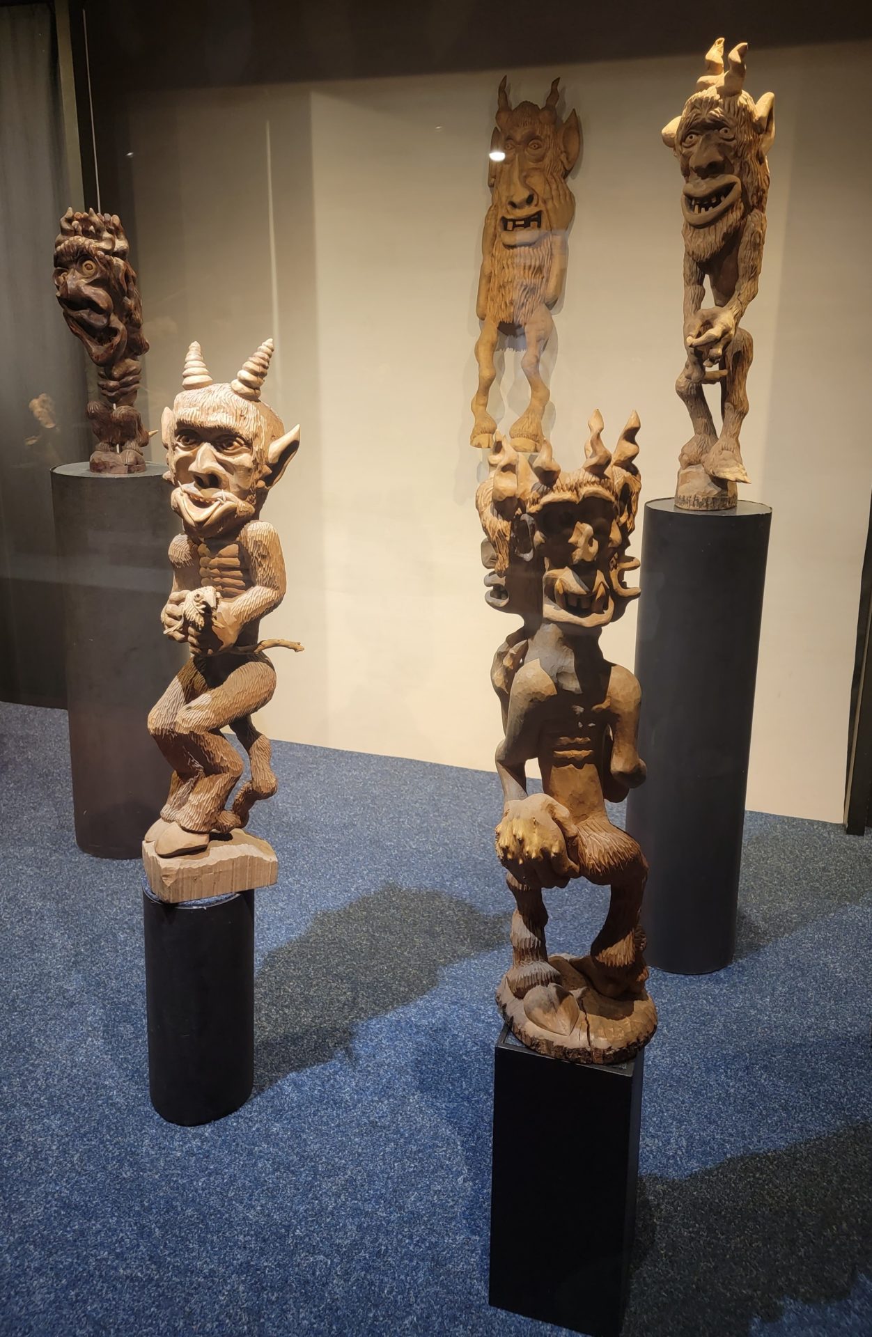 a group of wooden statues