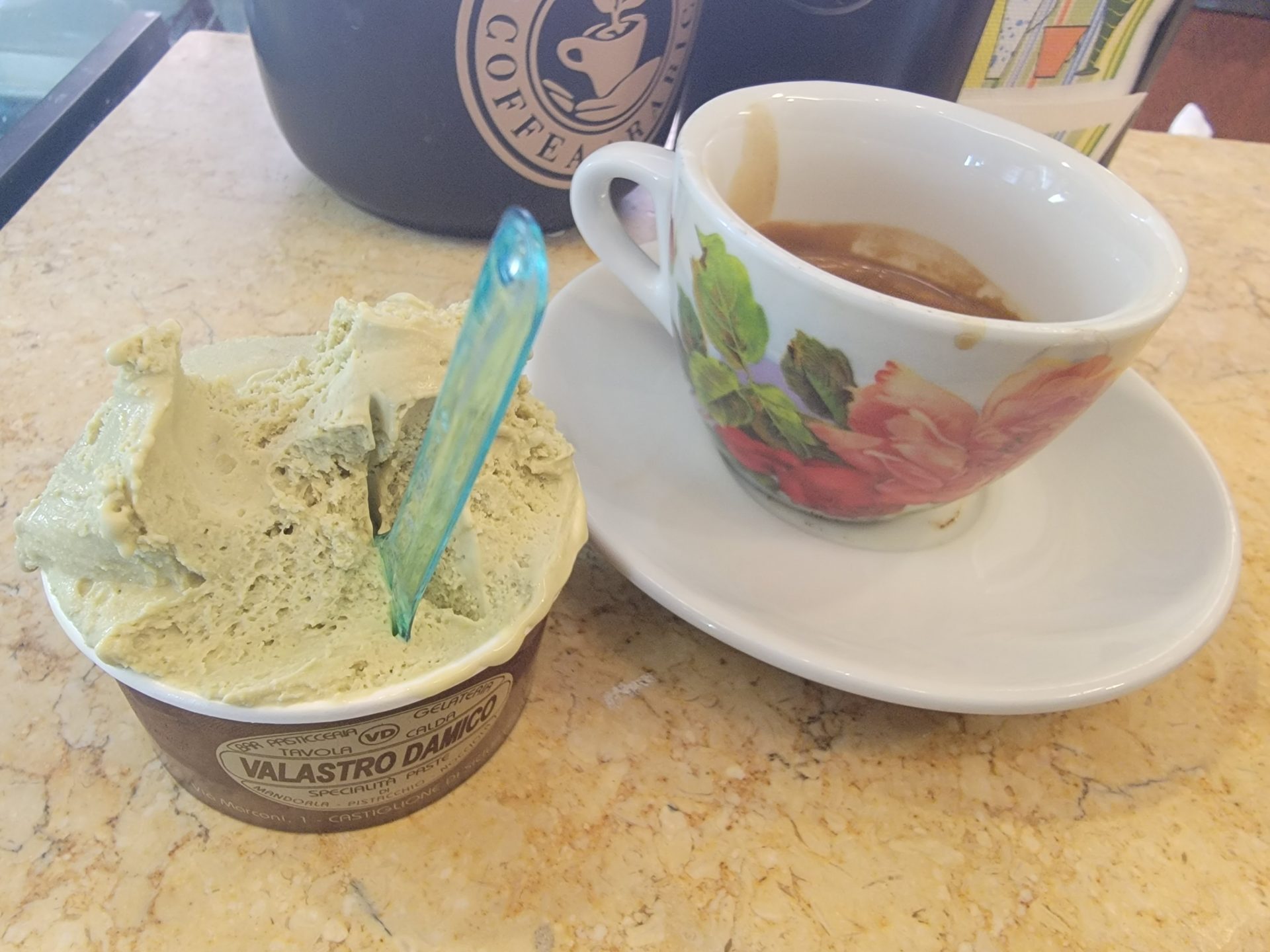 a cup of ice cream and a cup of coffee