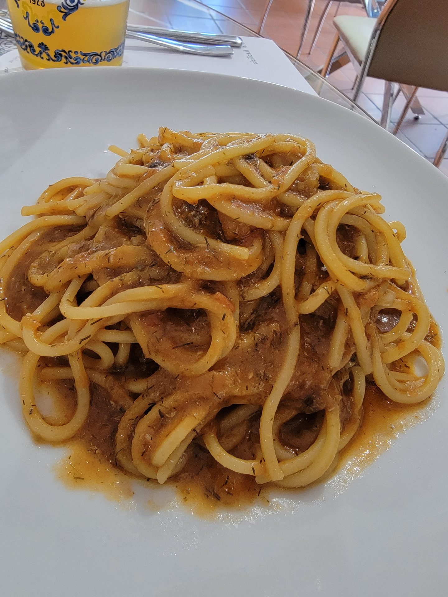 a plate of spaghetti with sauce