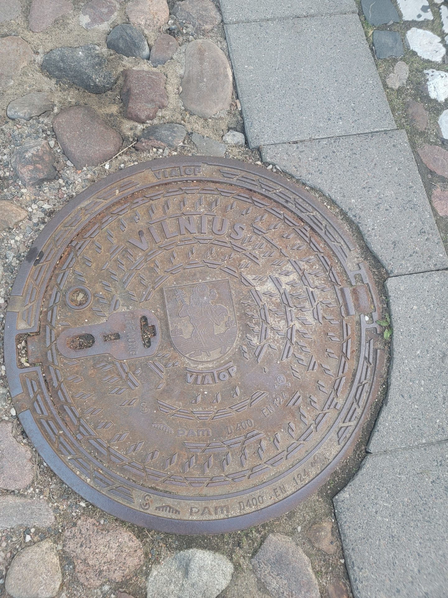 a manhole cover on the ground