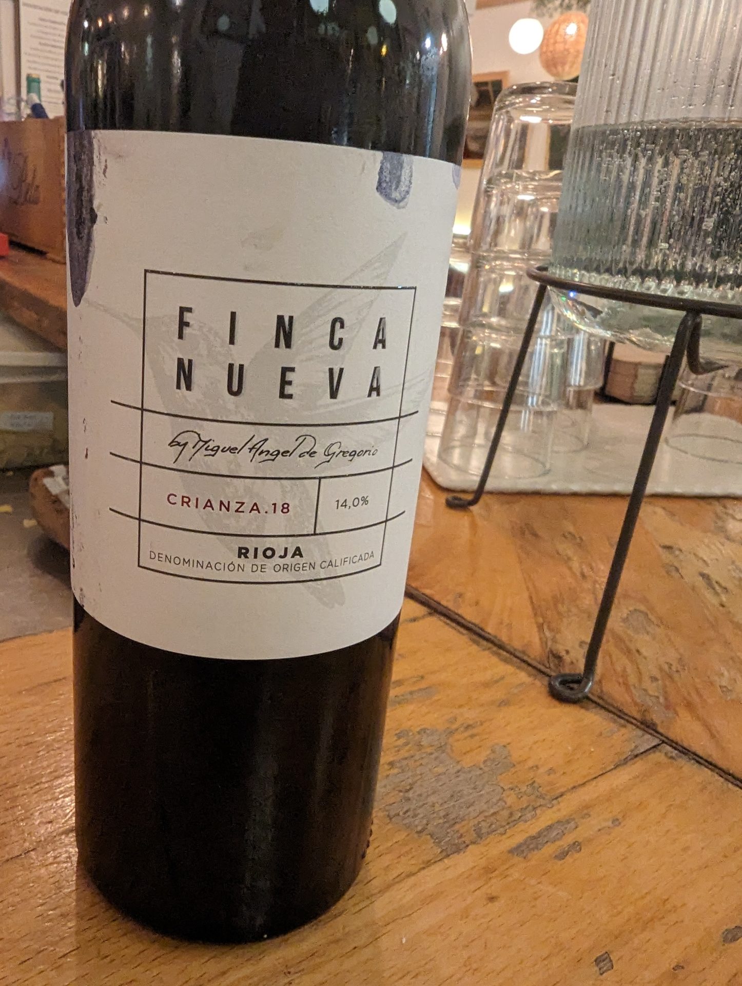 a bottle of wine on a table