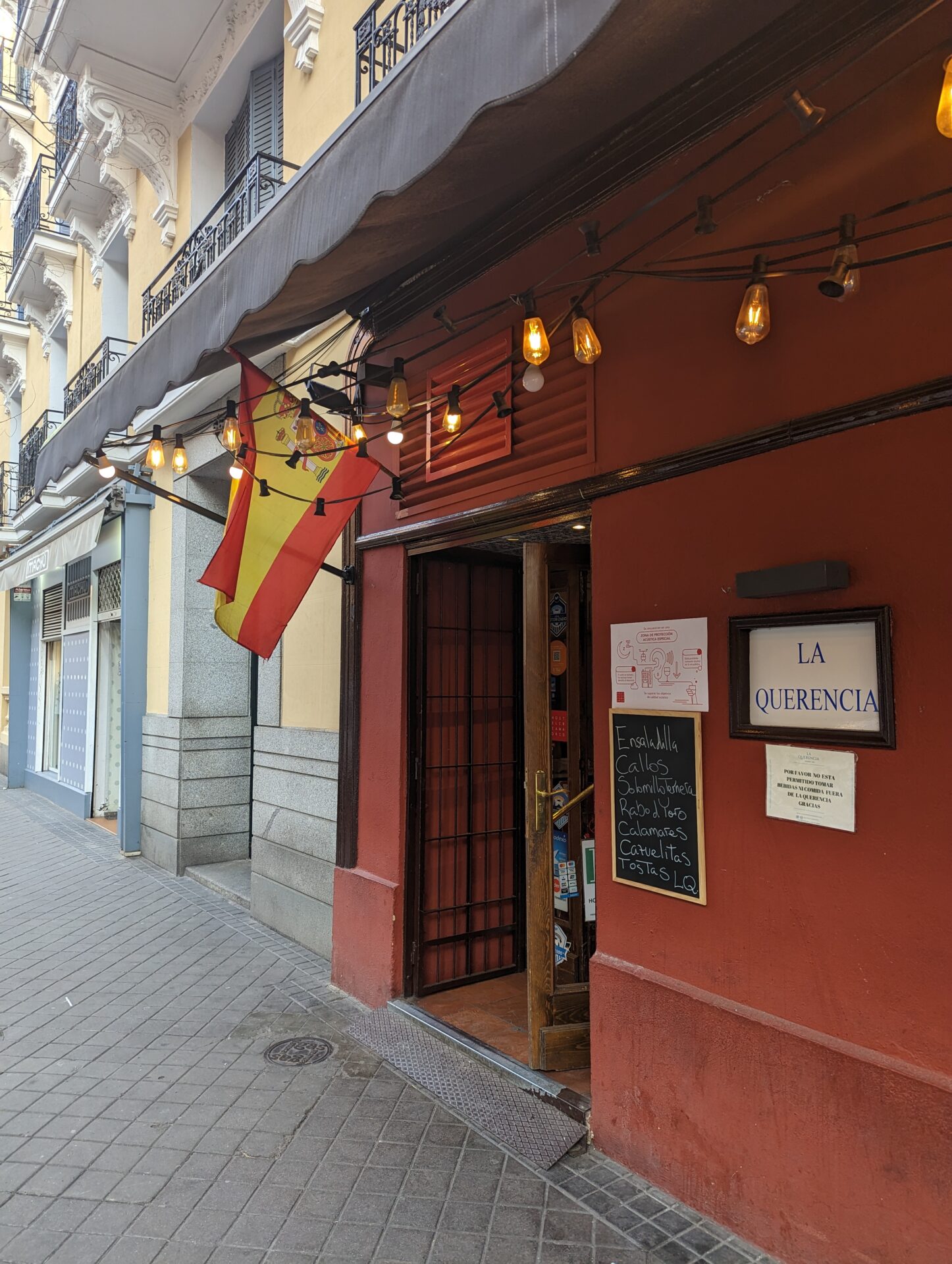 a building with flags on the side