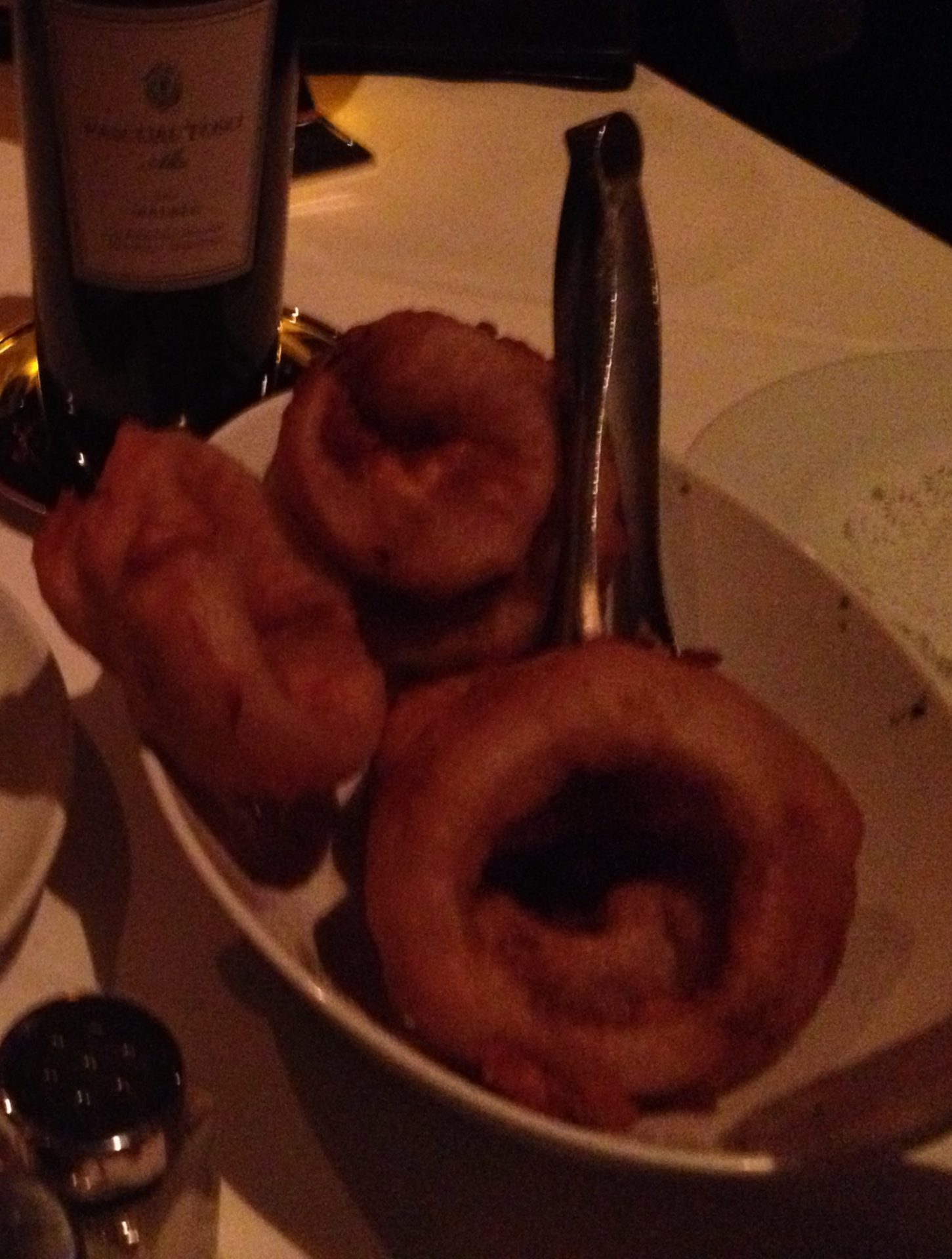 a plate of fried onion rings
