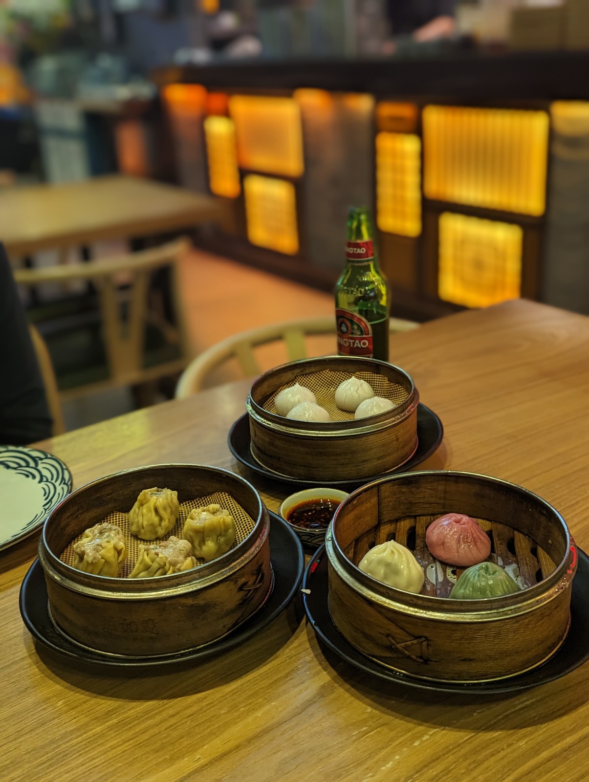 a group of dim sum baskets on a table