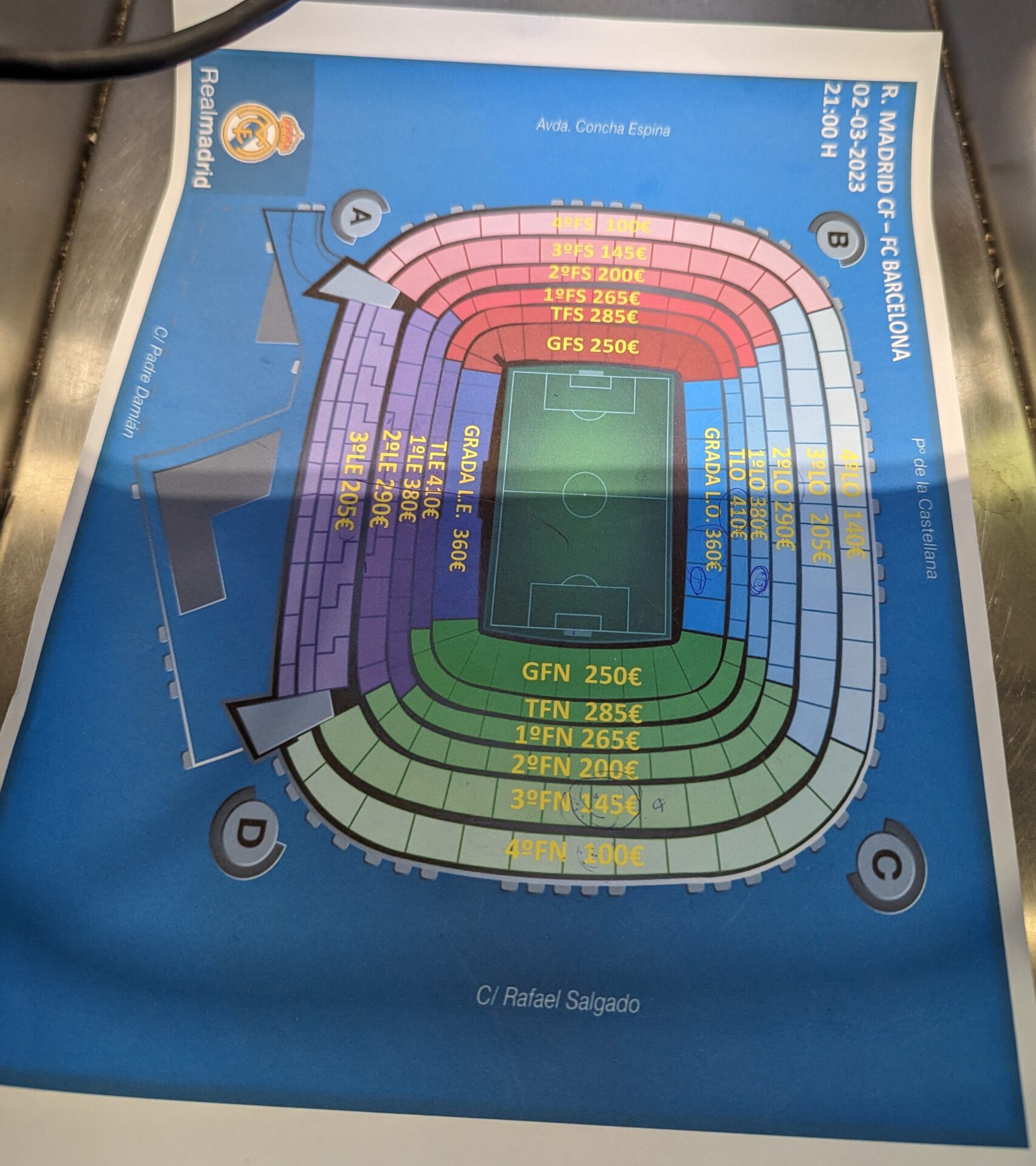 a blue paper with a stadium map