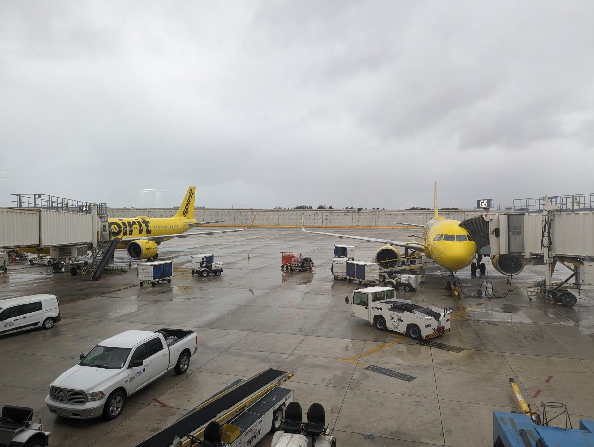 a yellow airplane on a tarmac