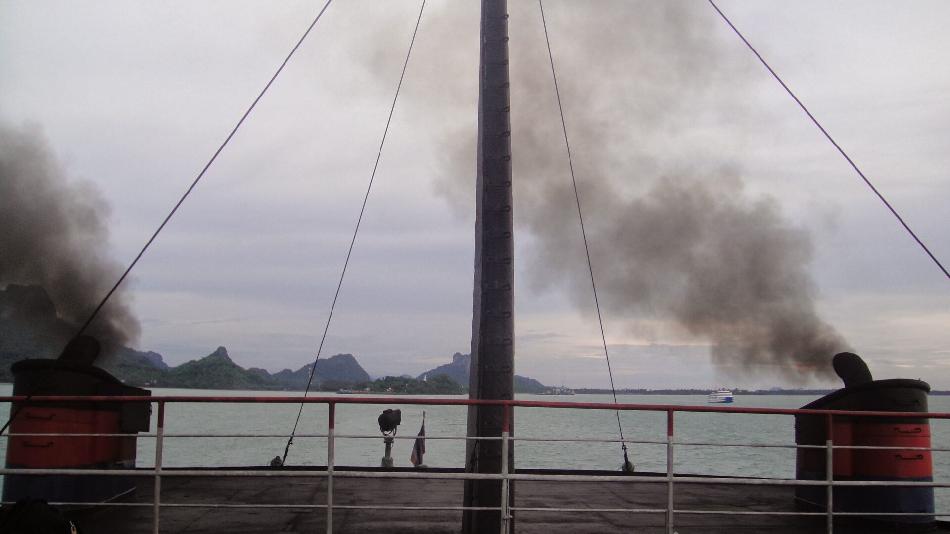 a smoke coming out of a boat