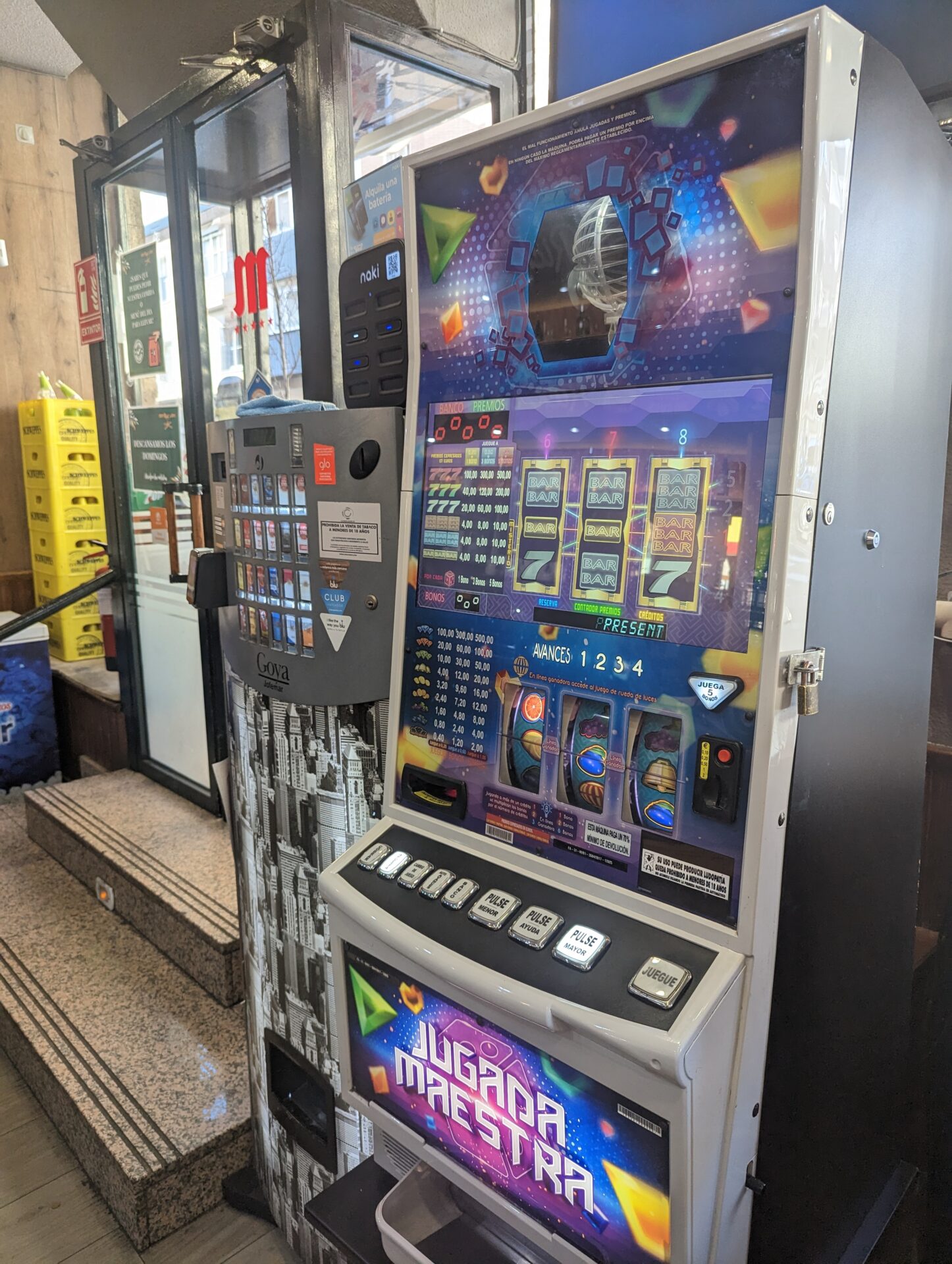 a machine with buttons and a game