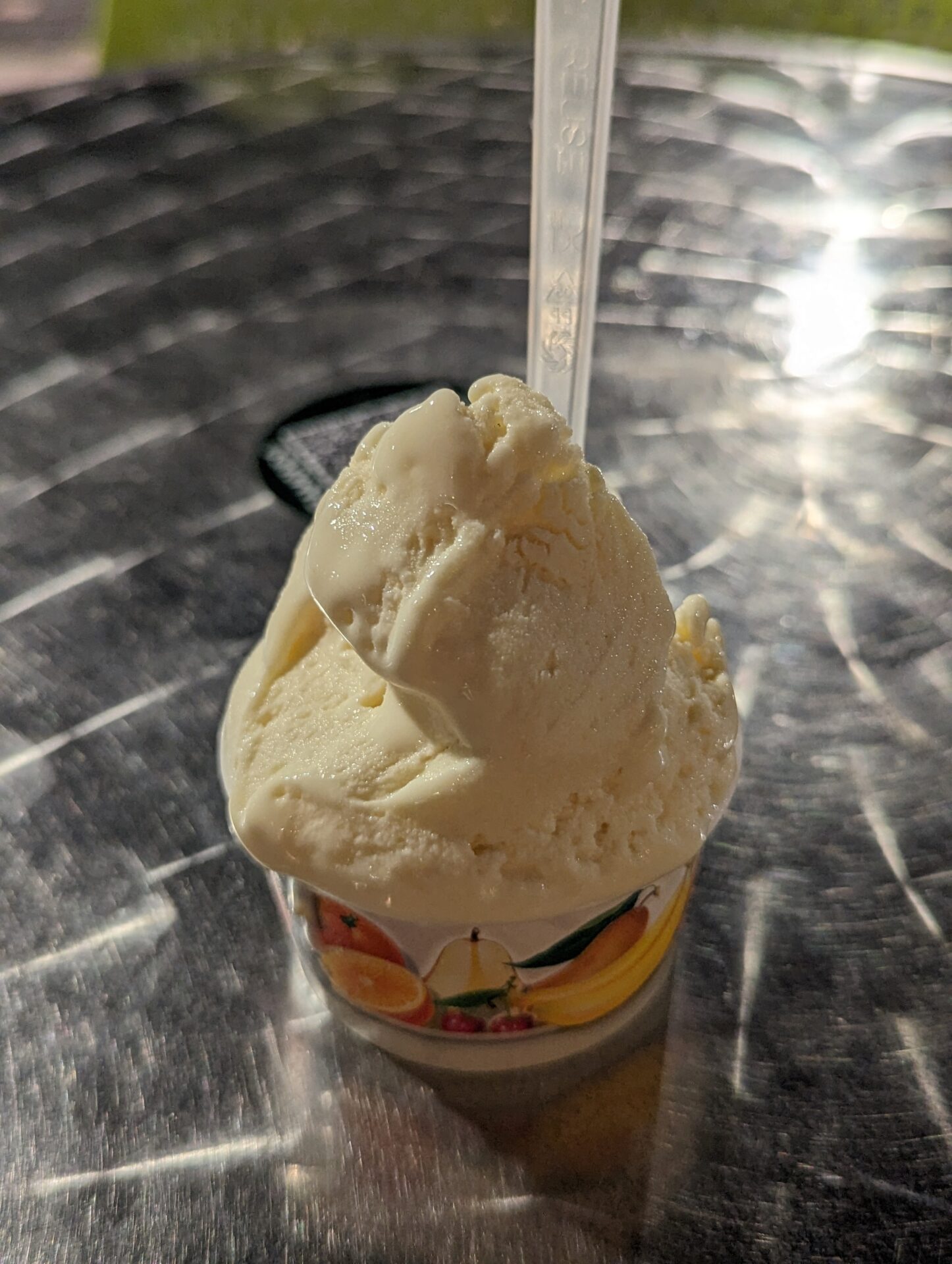 a cup of ice cream with a spoon