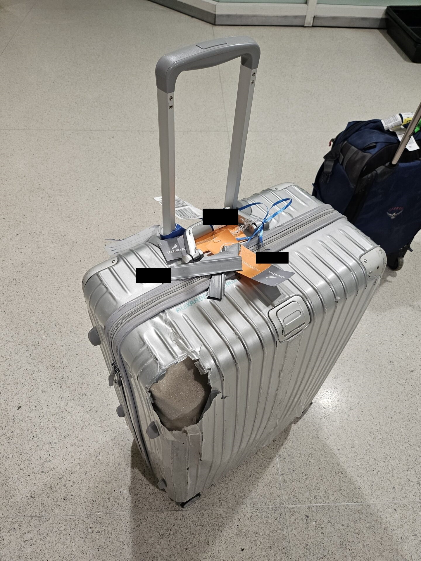 a broken suitcase with a handle
