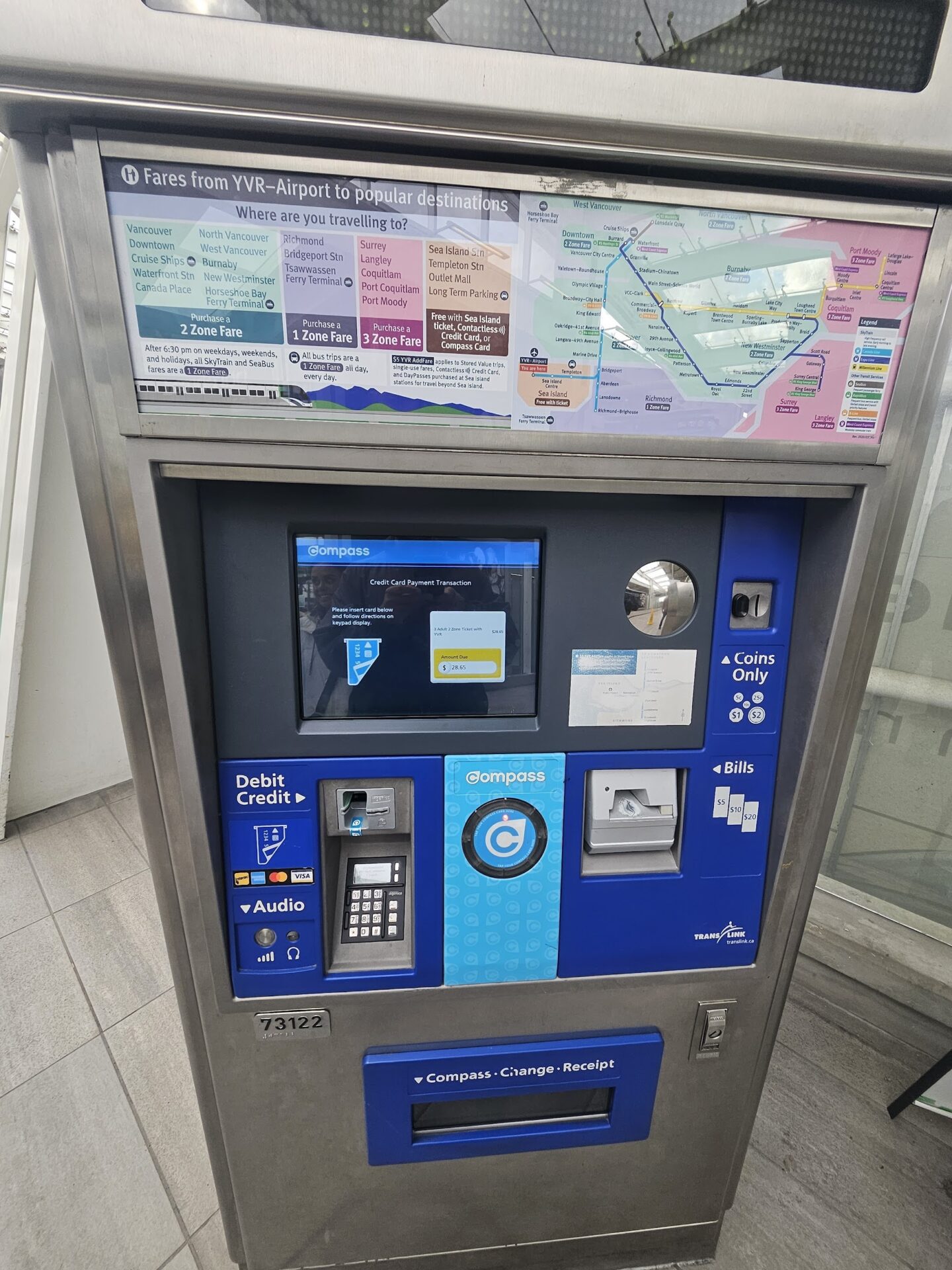 a machine with a screen and a map