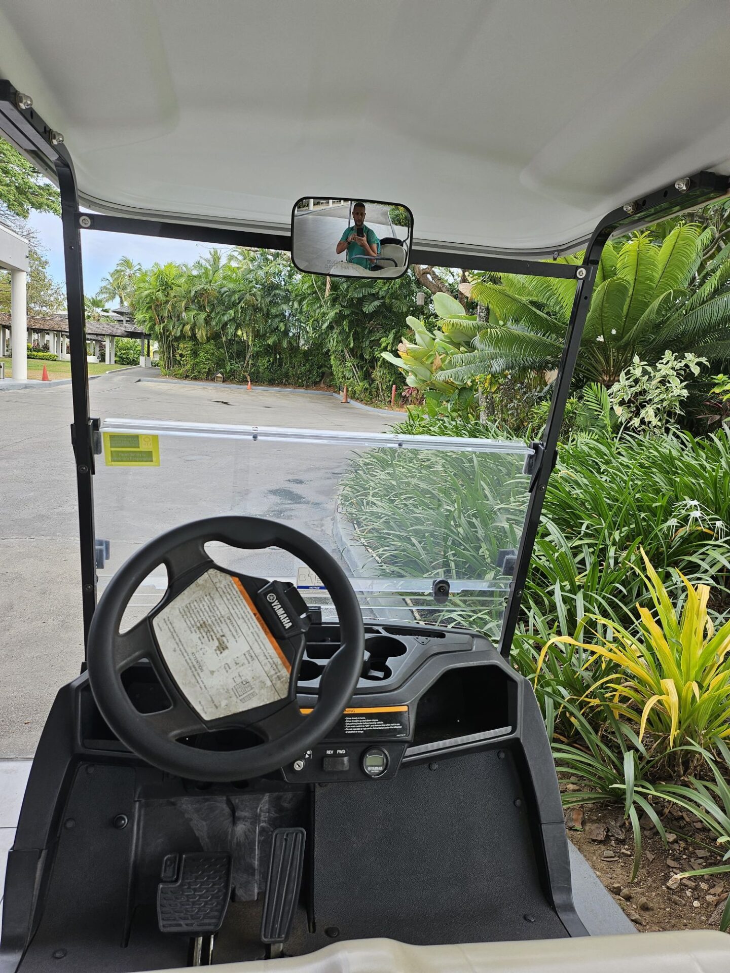 a golf cart with a person in the back