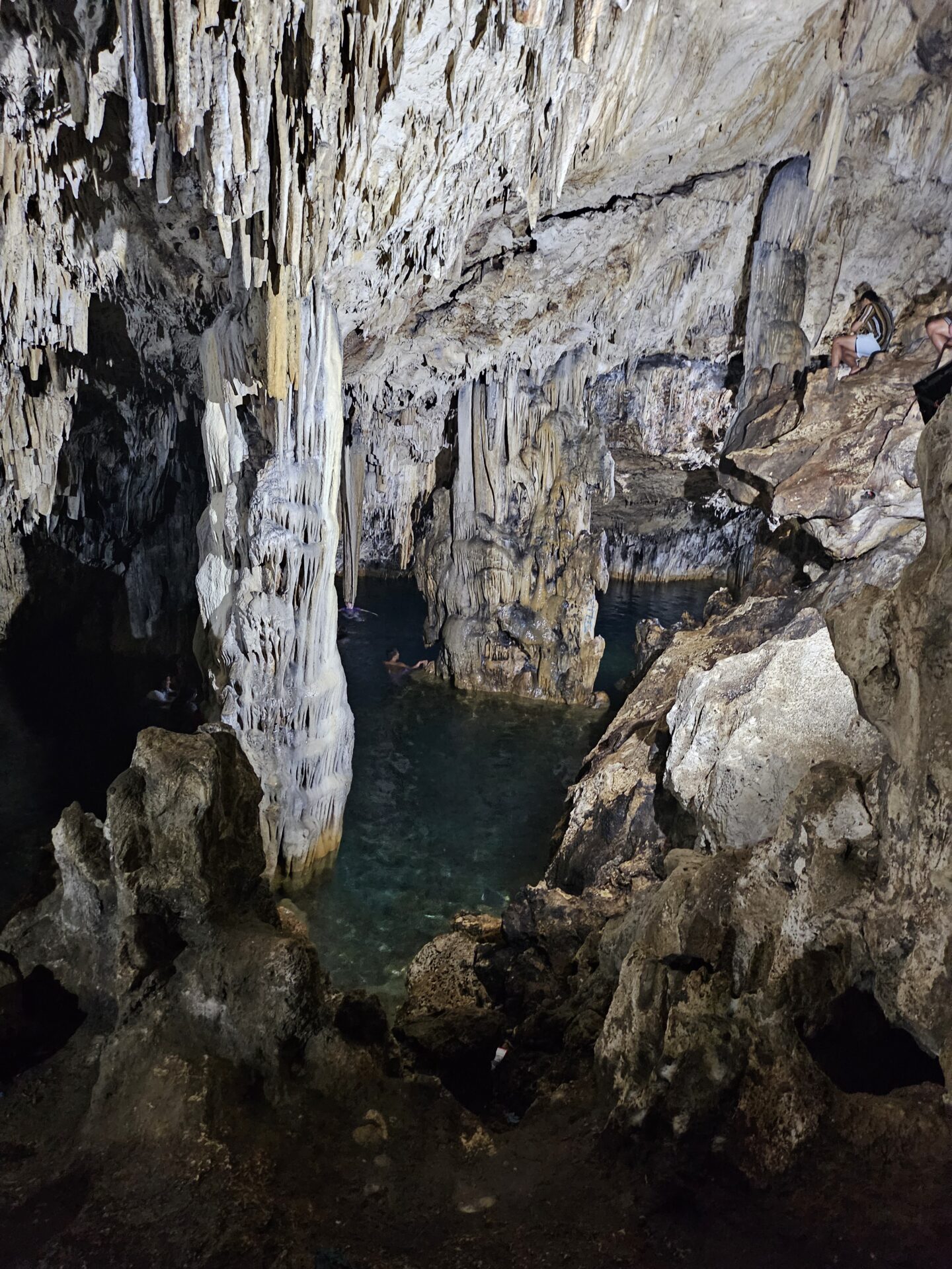 a cave with water and rocks
