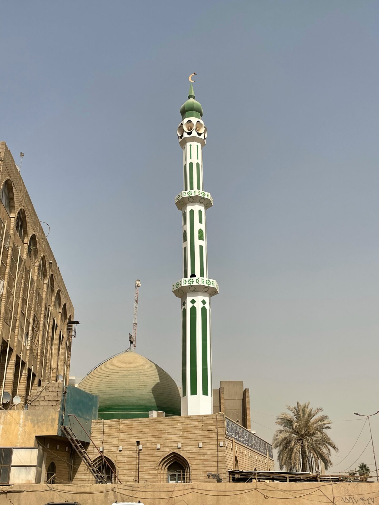 a green and white tower