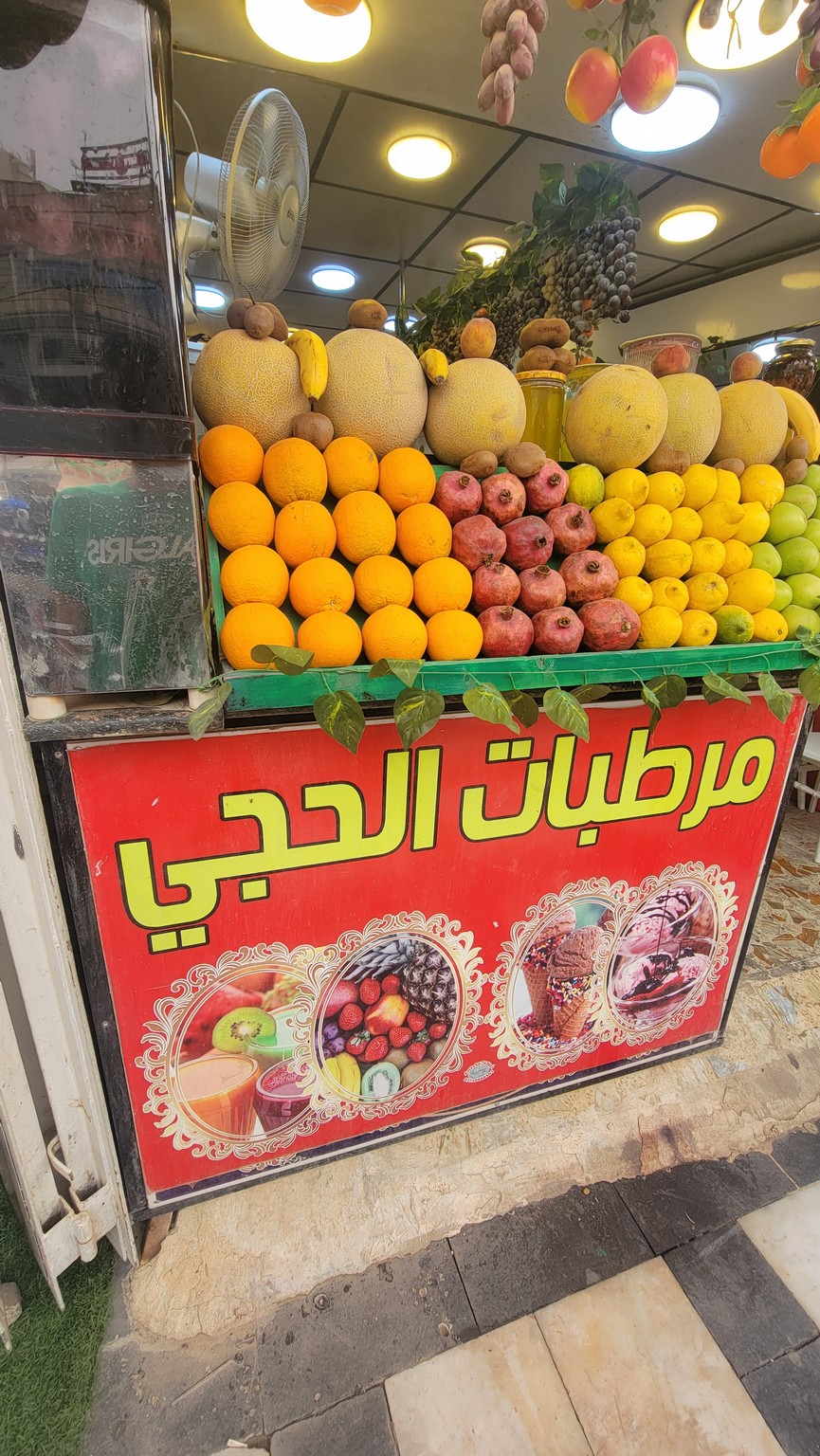a fruit stand with a variety of fruits