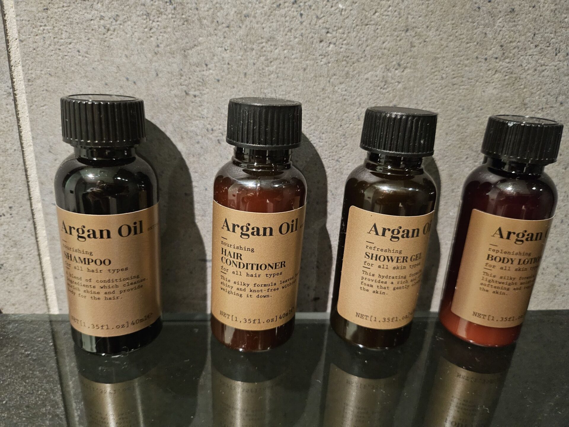 a group of small bottles with labels