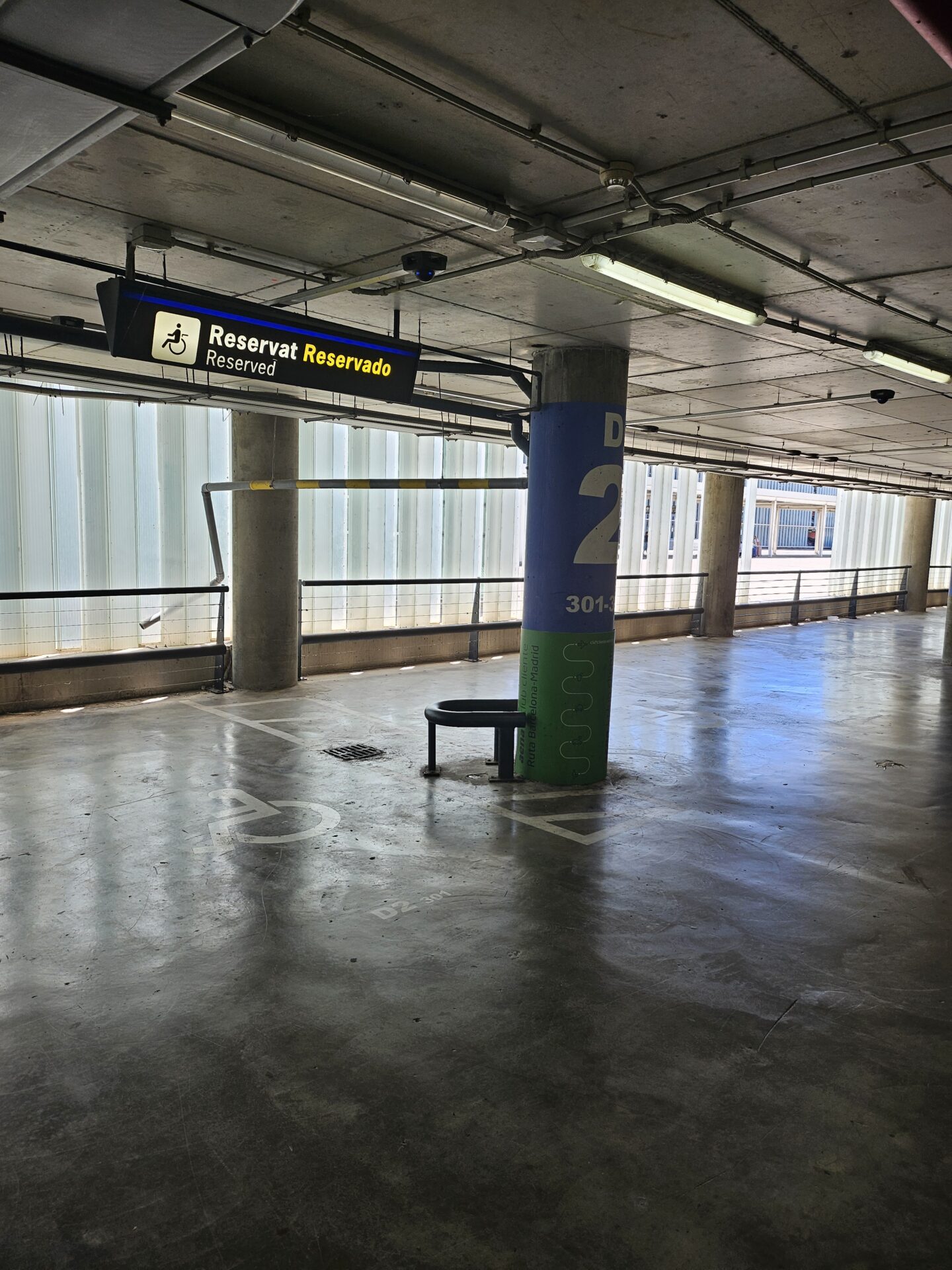 a bench in a parking garage