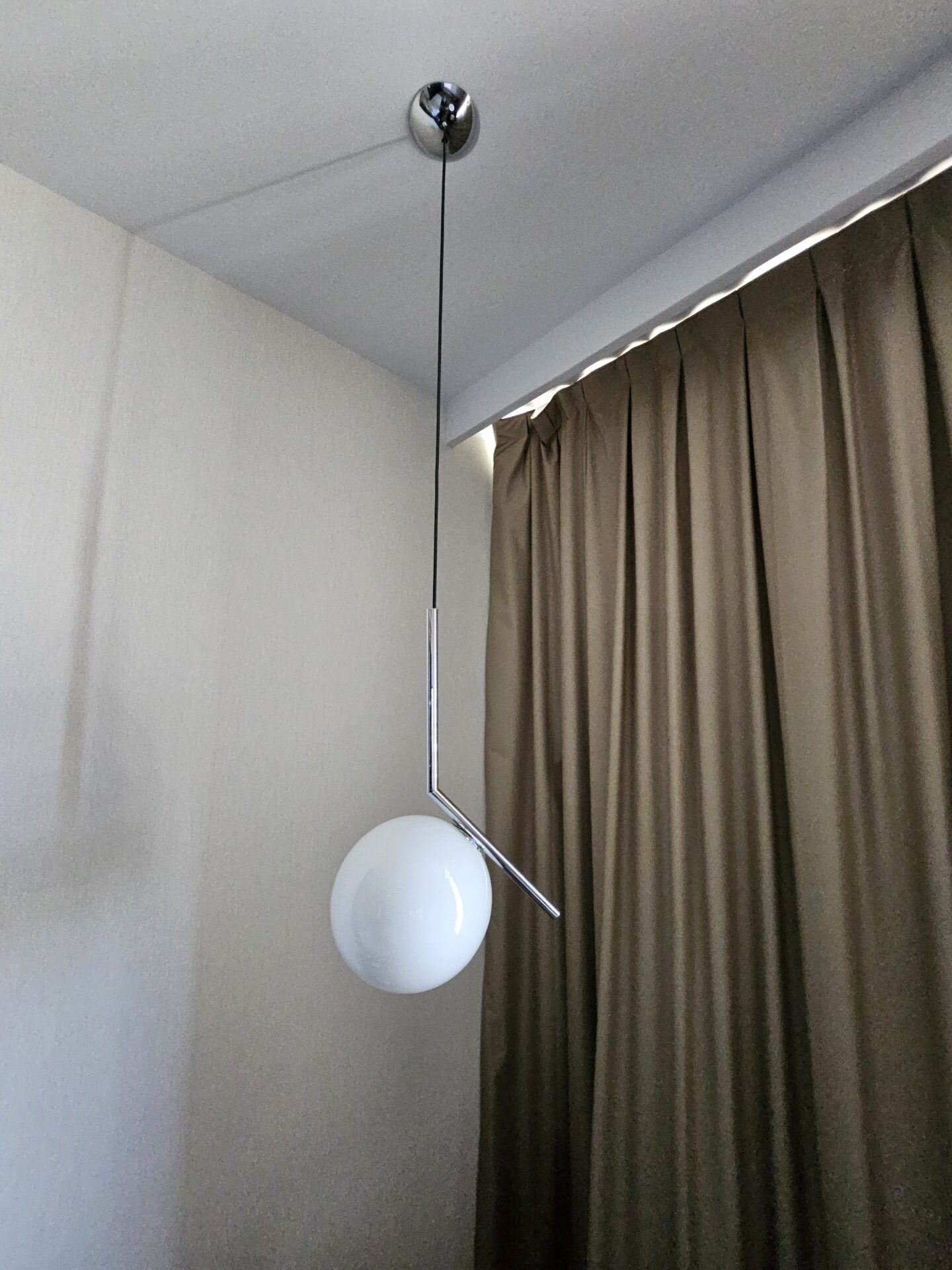 a light fixture from a ceiling