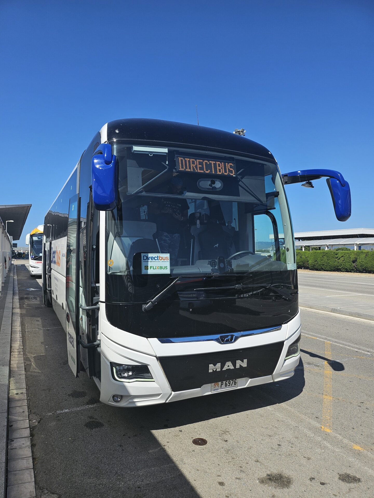 a bus parked on the side of a road