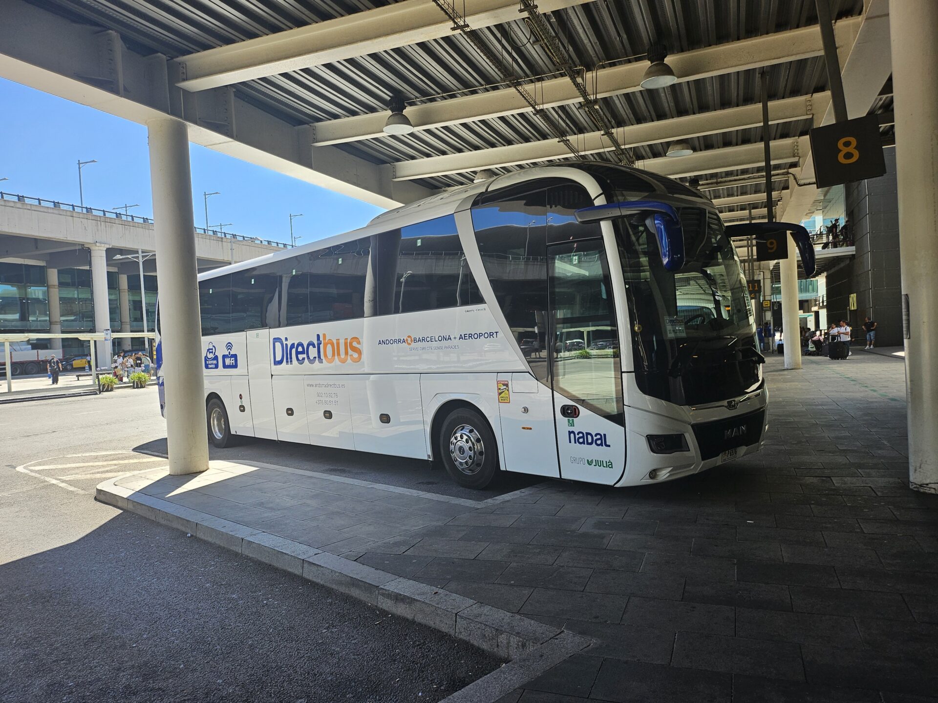 a bus parked under a roof