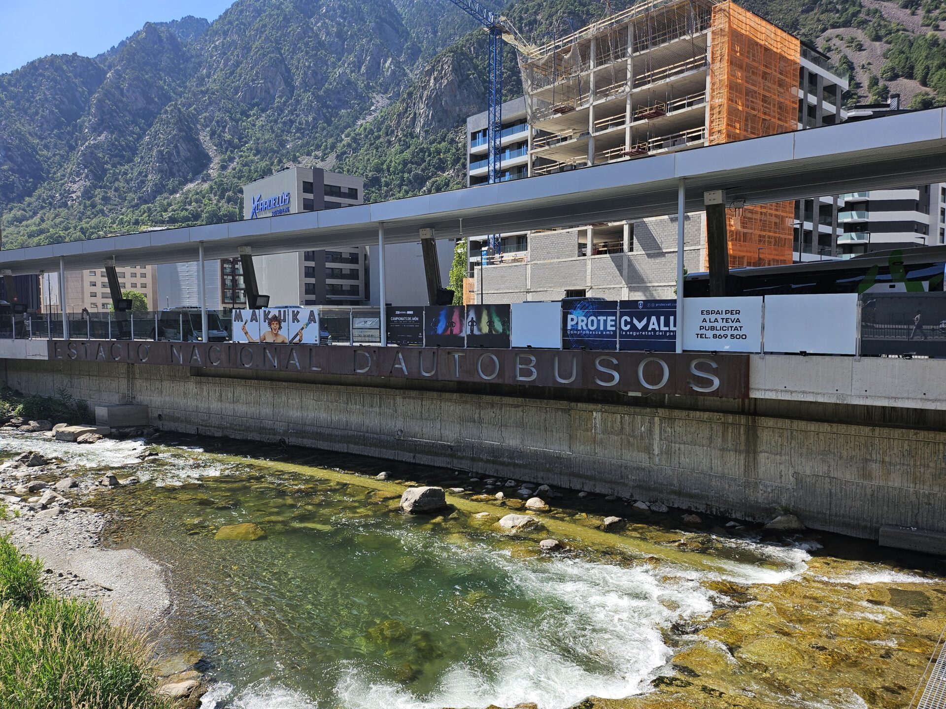 a building next to a river